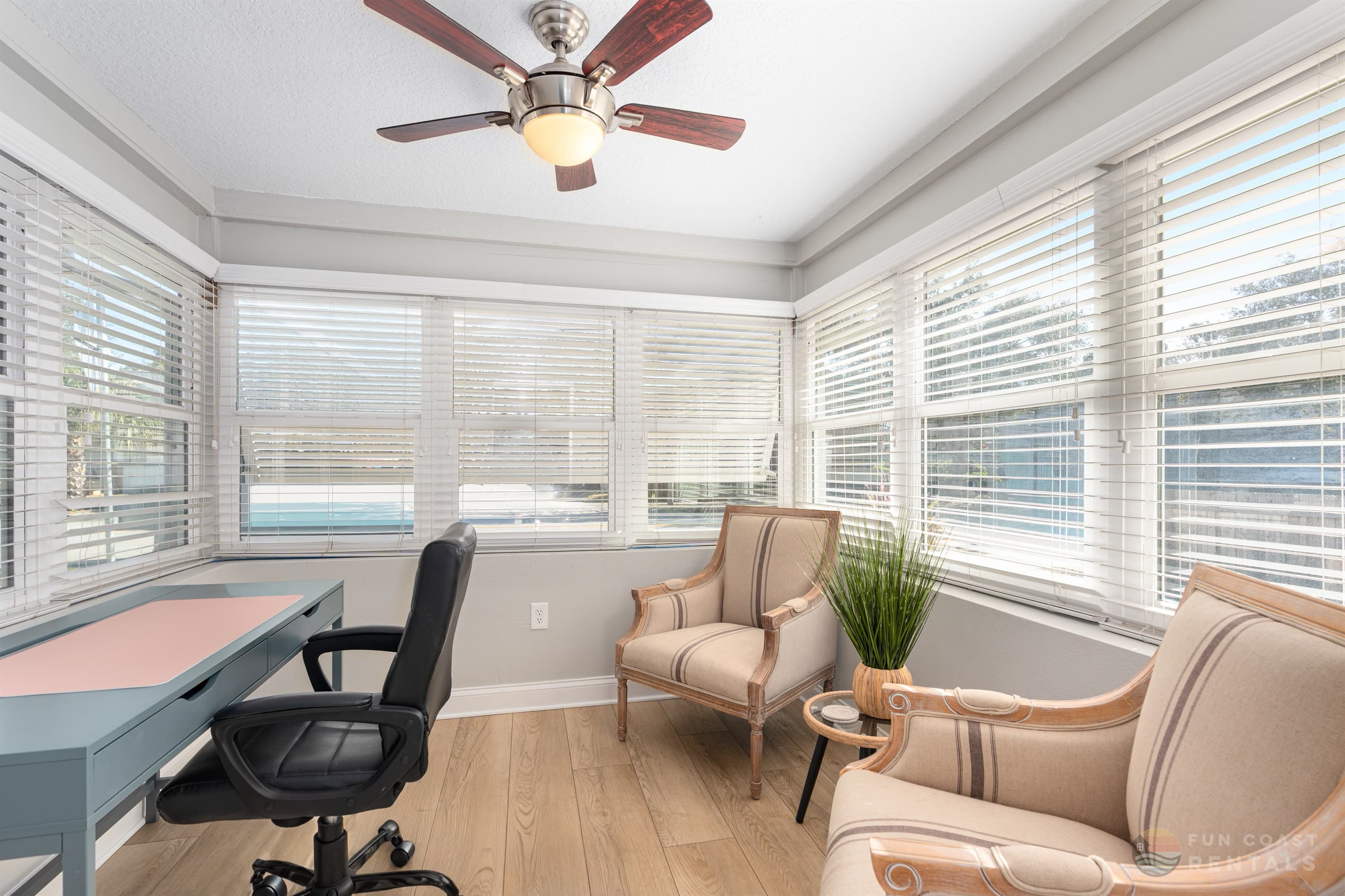 Home Office with ergonomic chair and natural light!