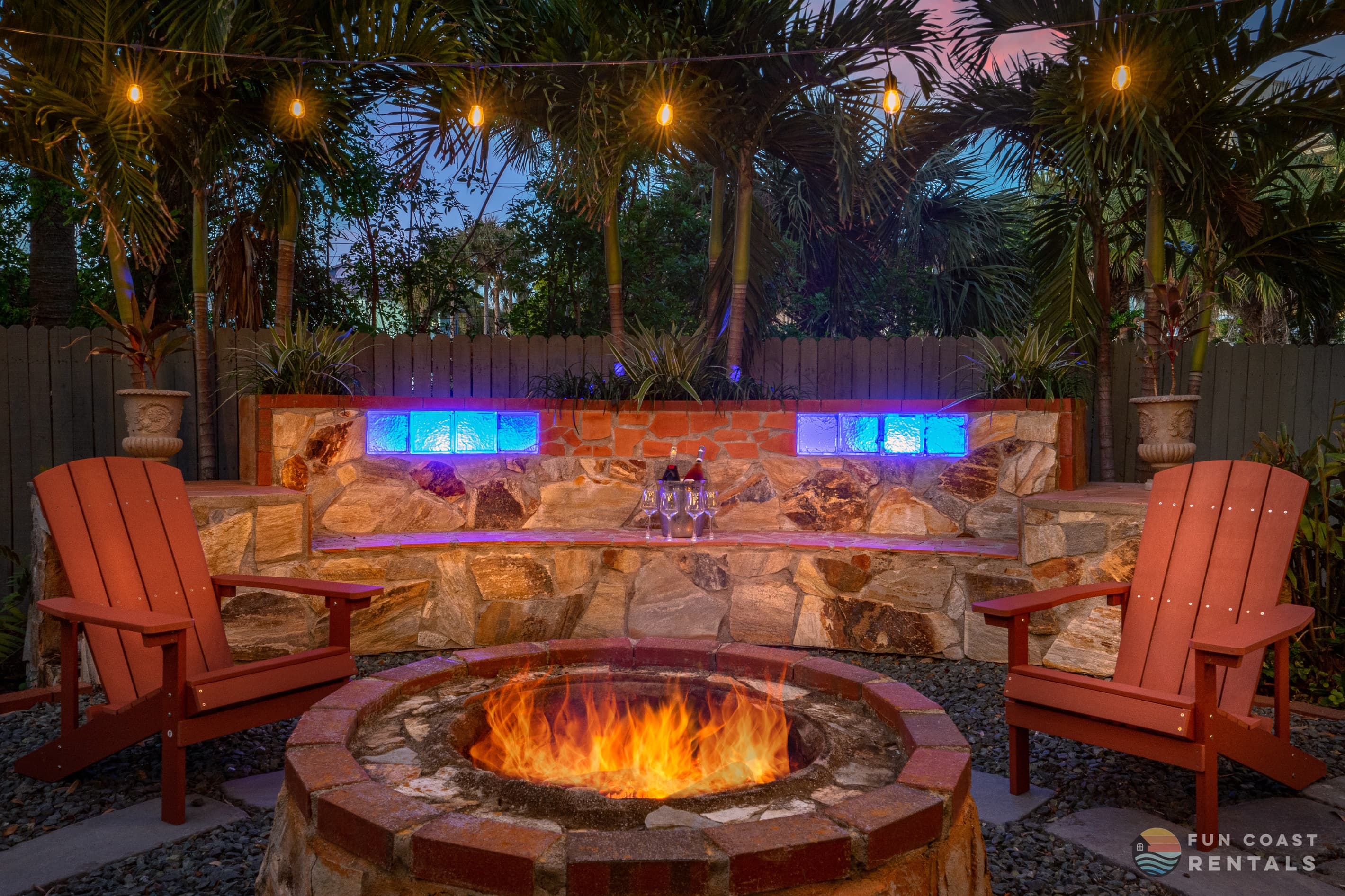 Private and inviting string lit zen Backyard with wood fire pit!