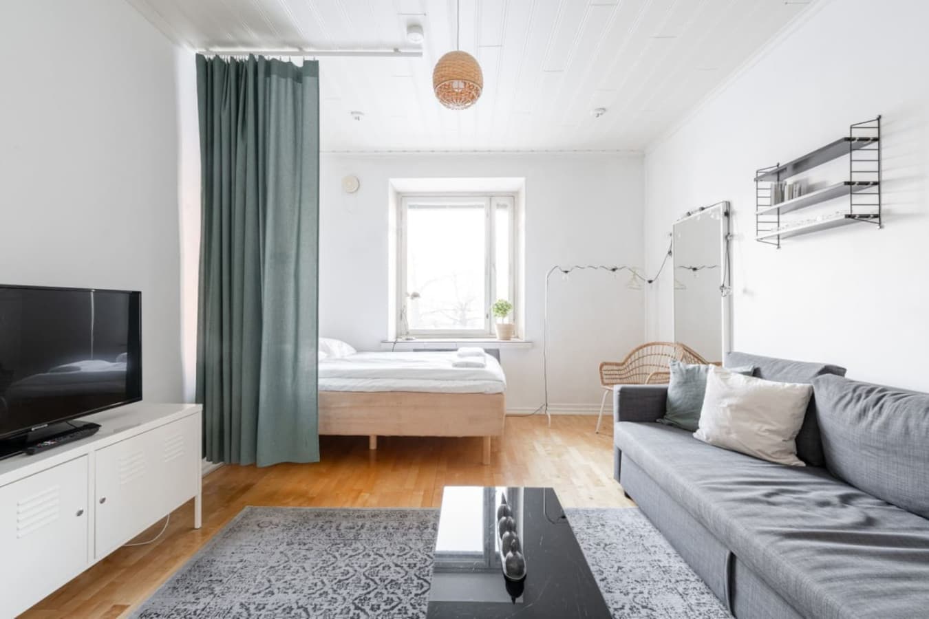 Apartment living room with bed sofa and 140cm wide bed