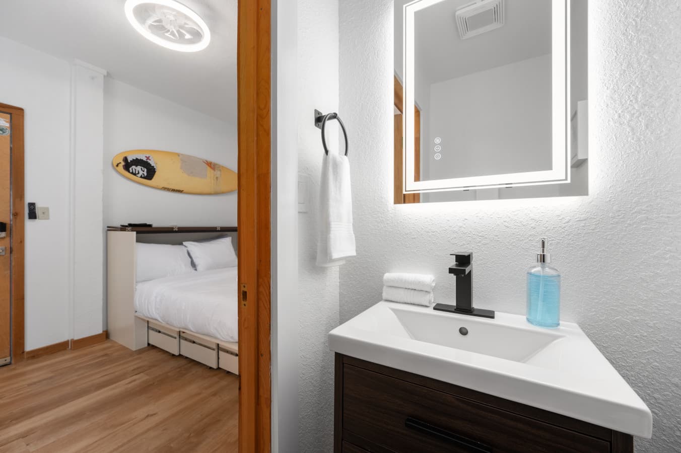 Private half bath (toilet & sink) inside the separate-entry first-level guest suite