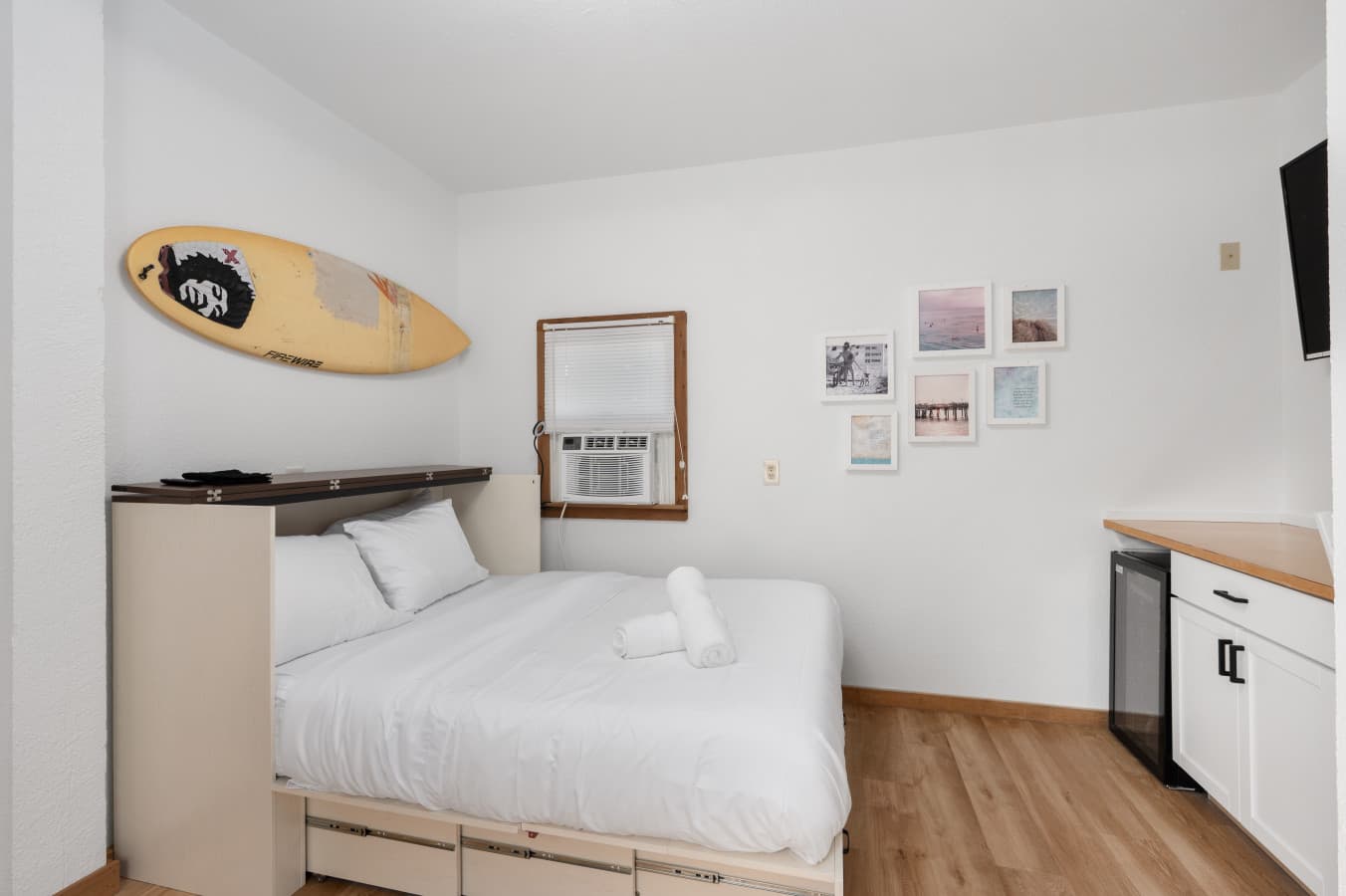 First-level guest suite (Bedroom 4) w/ its own smart-lock entrance by the hot tub deck — no interior access from the main house