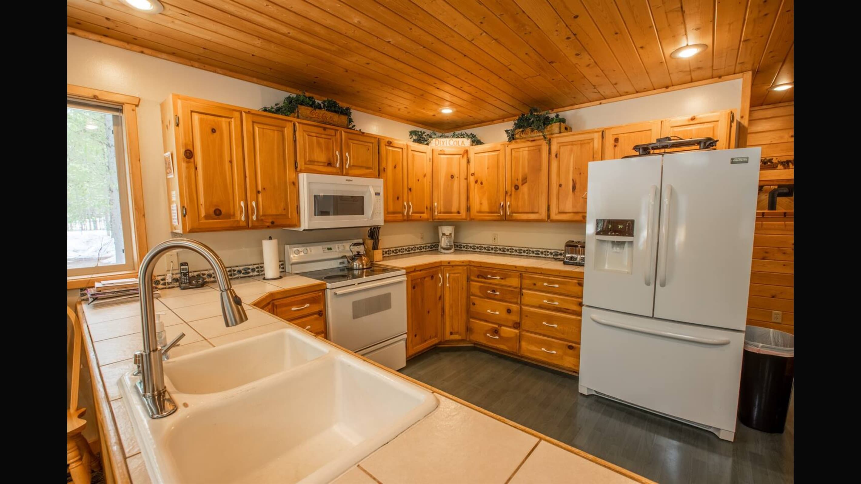 Well stocked kitchen with large refrigerator. Perfect for big groups or multiple families.