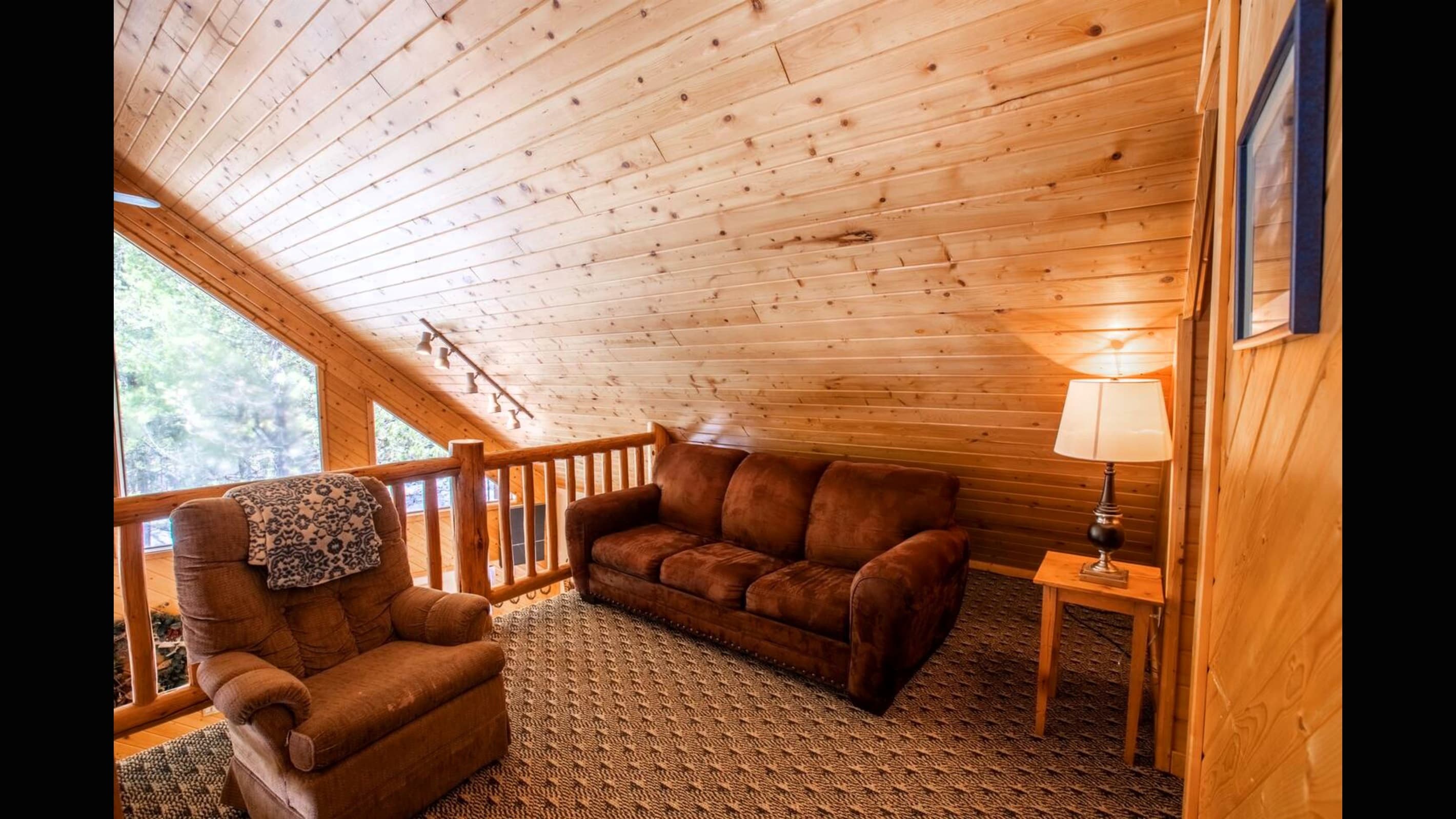 The upstairs loft is a great place to relax while reading one of the books in the library!