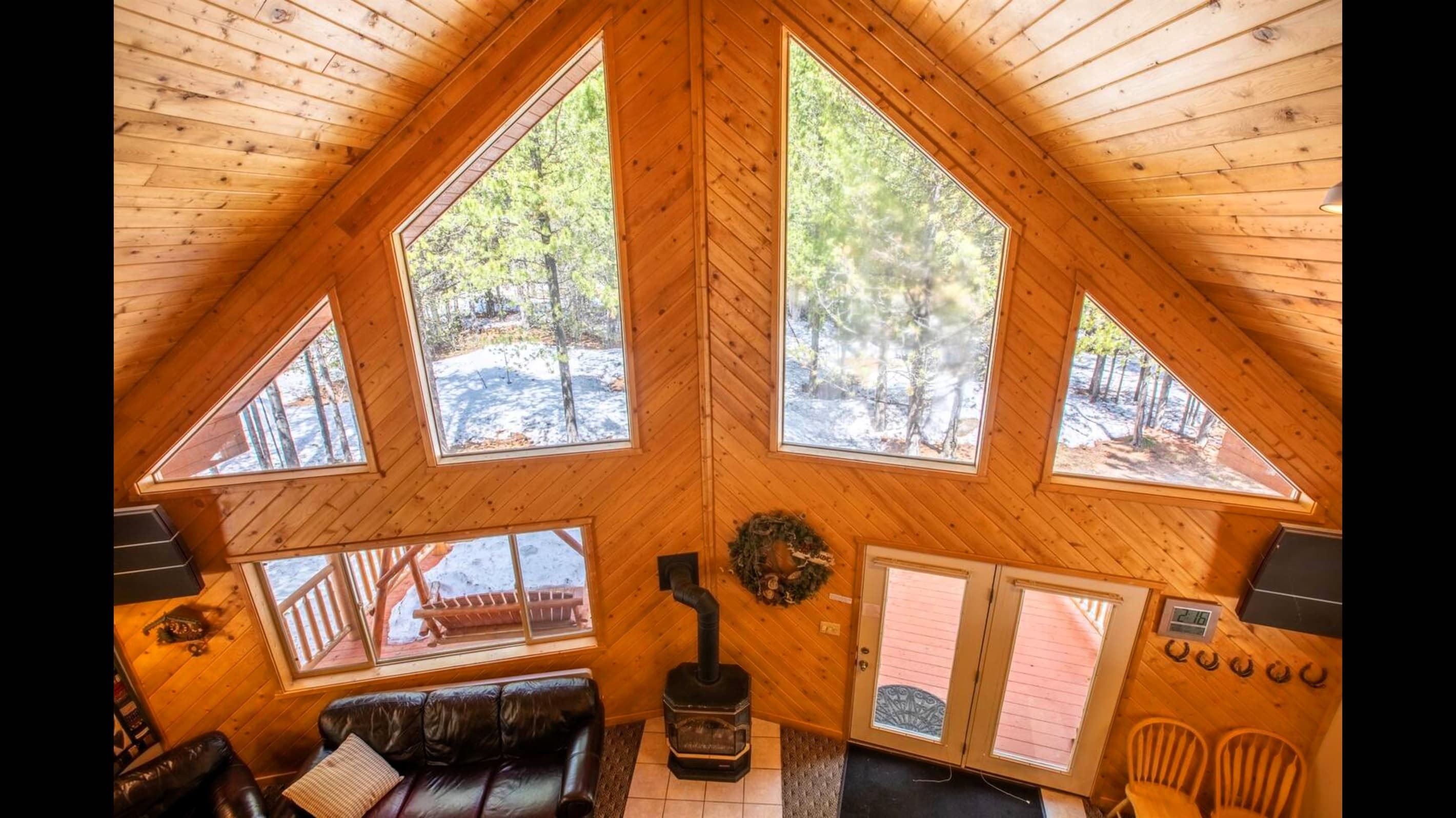 An enchanting view of the woods from the loft view.  