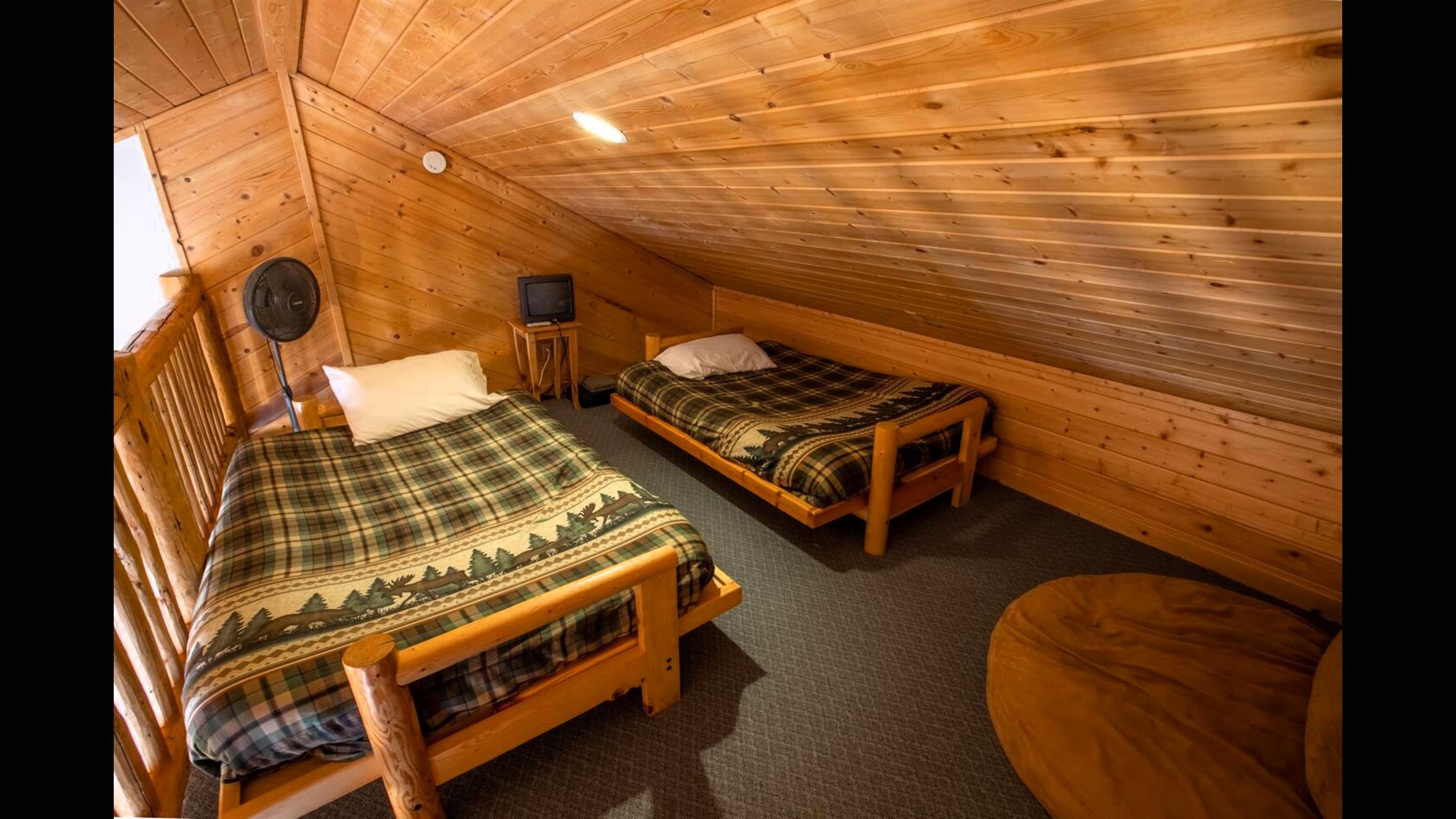 Loft #2 with two double beds.  Great space for kids.