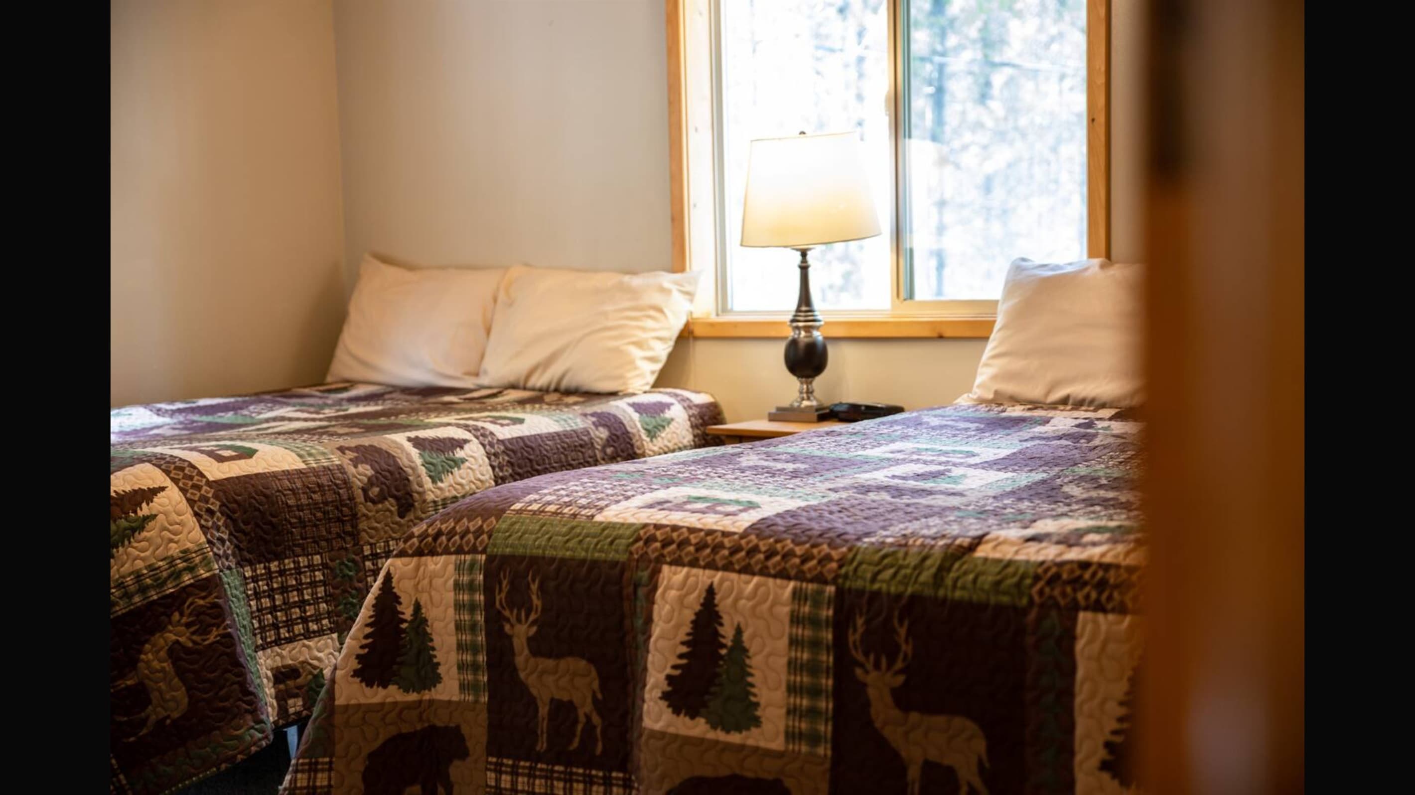Bedroom #3 is an inviting and cozy space to settle in and enjoy