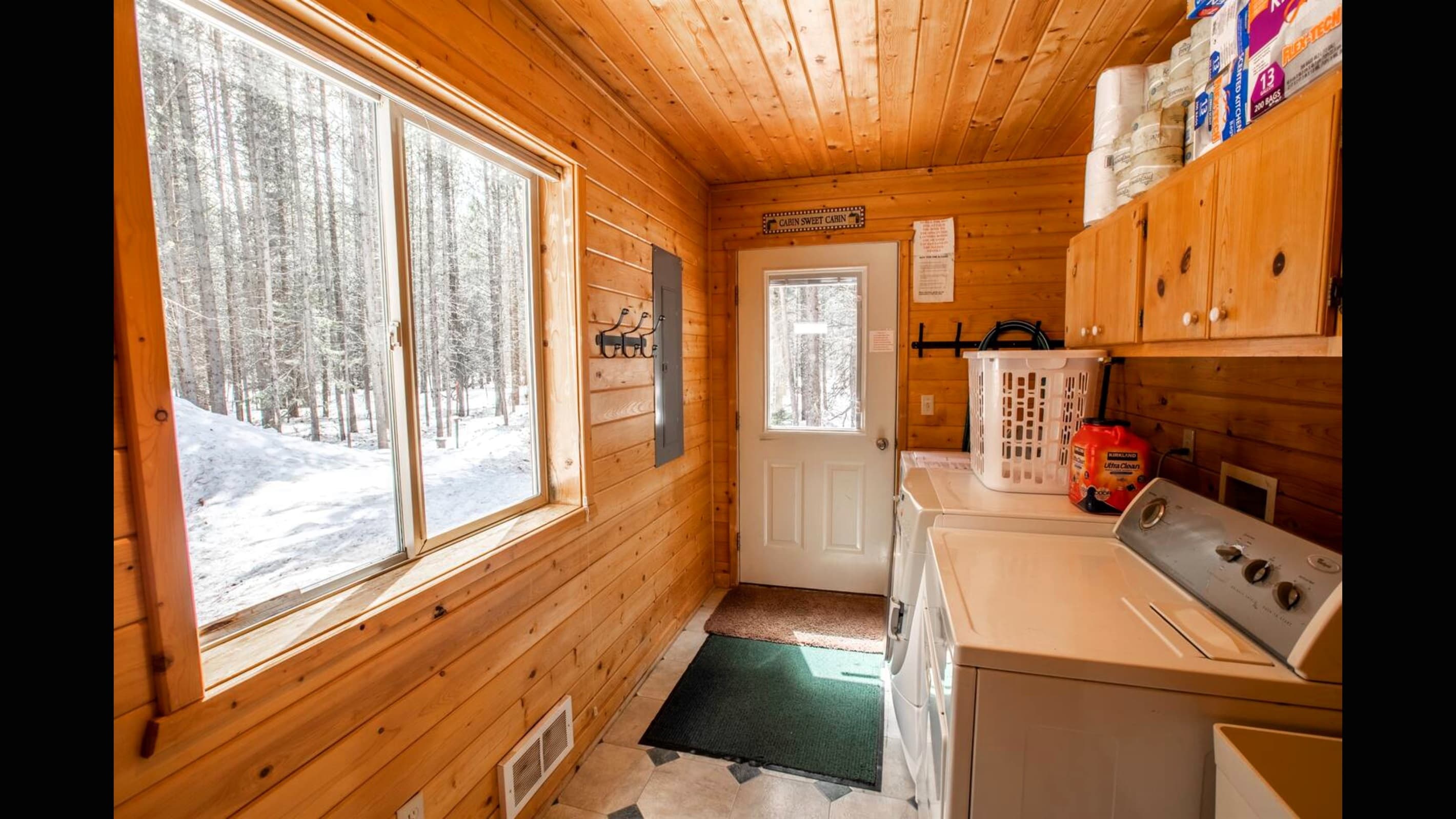 Laundry room with 2 dryers. Perfect for drying of wet clothes from the snow!