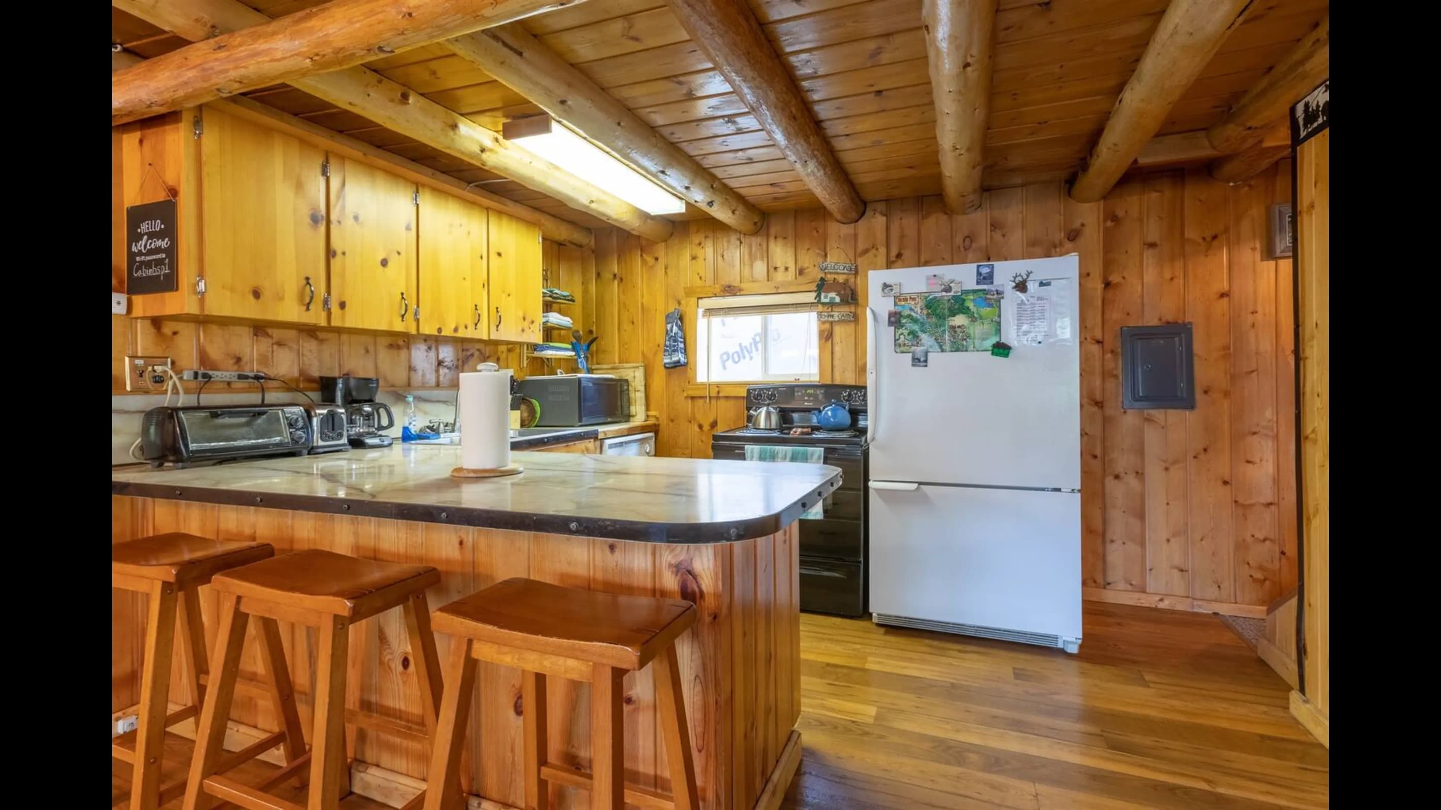 Kitchen is fully equipped with everything you need to whip up a tasty meal with friends and family. Seating at the large counter top invites conversation and memories to be made.