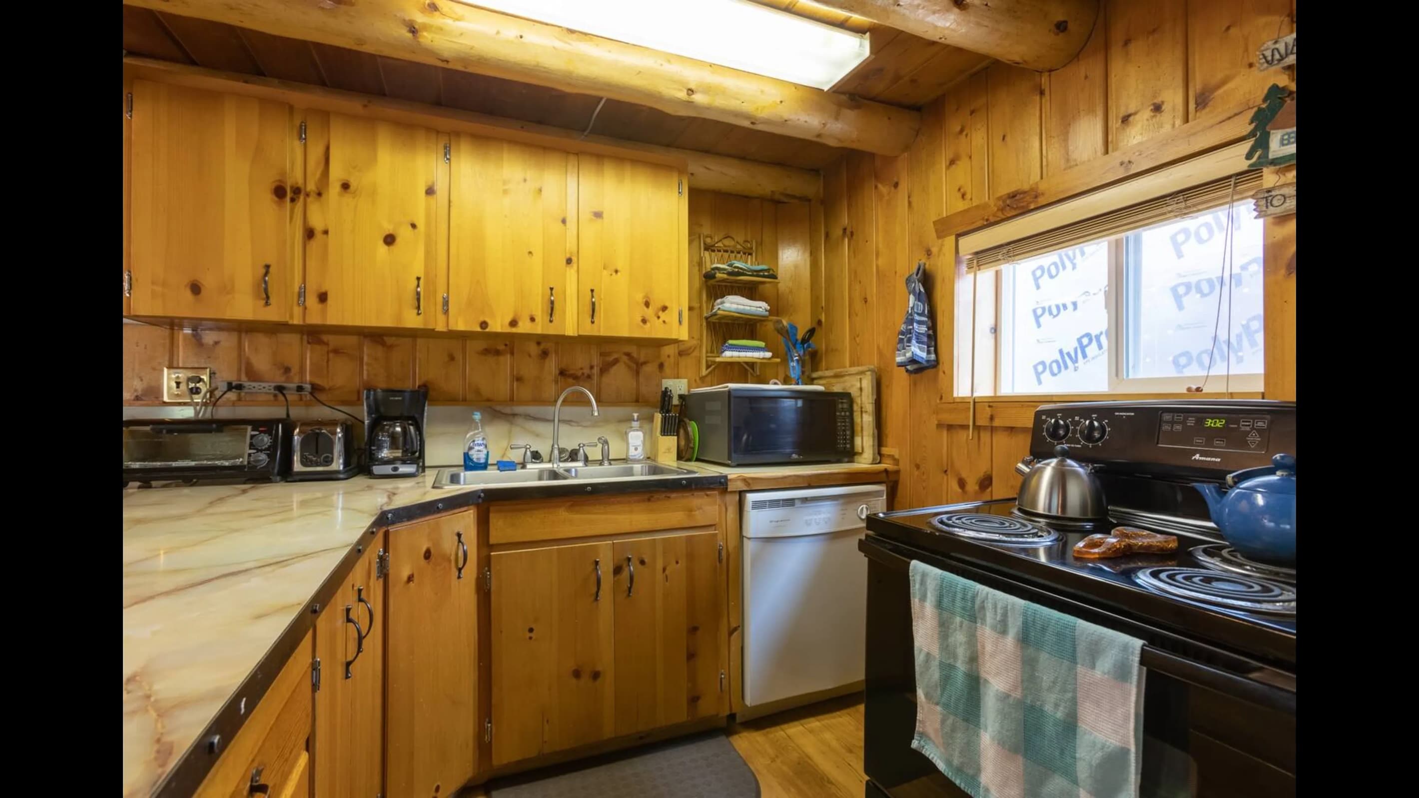 Feeding the family something delicious is a breeze in this well equipped kitchen.