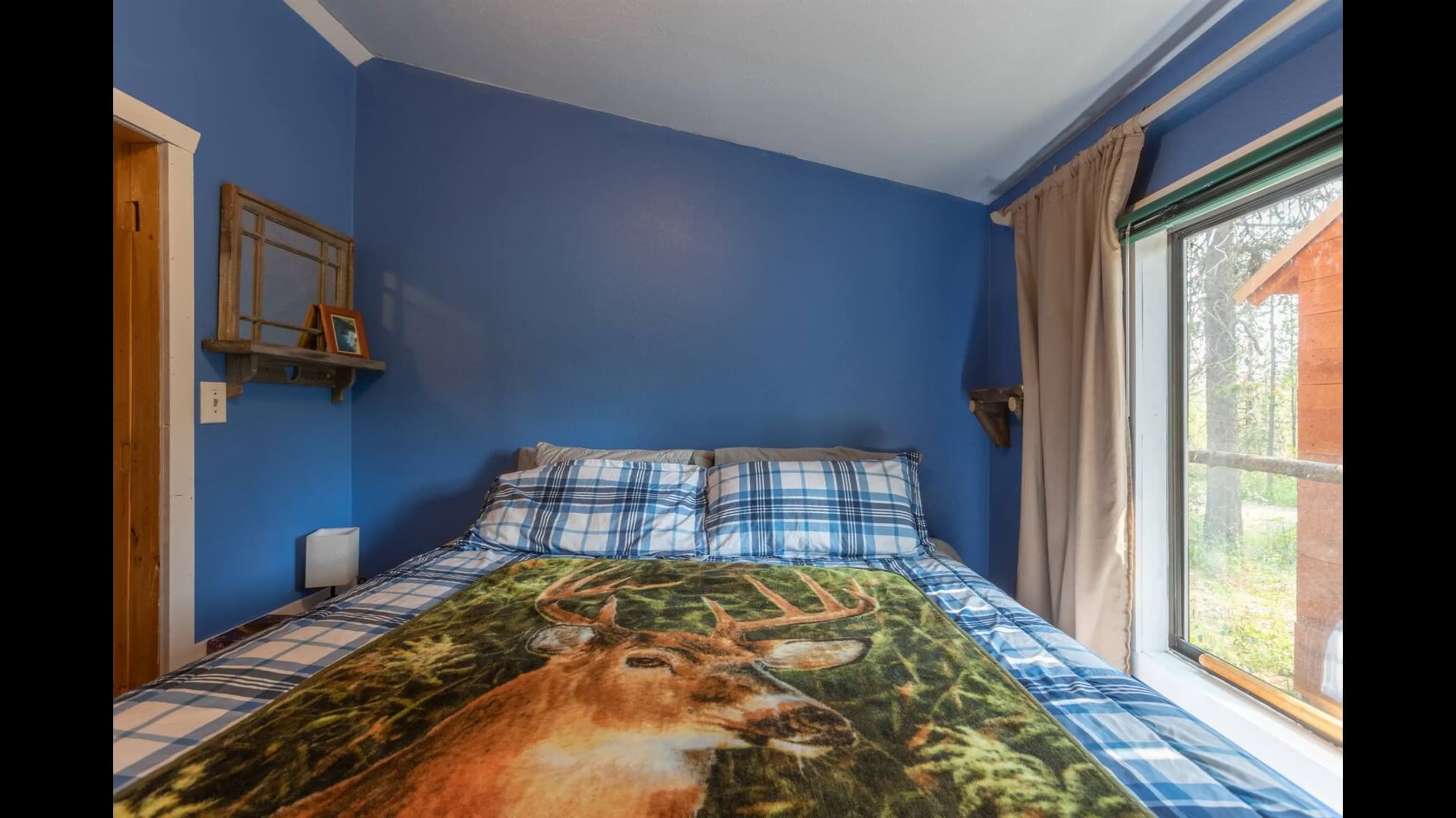 Lots of natural light in this lovely bedroom.