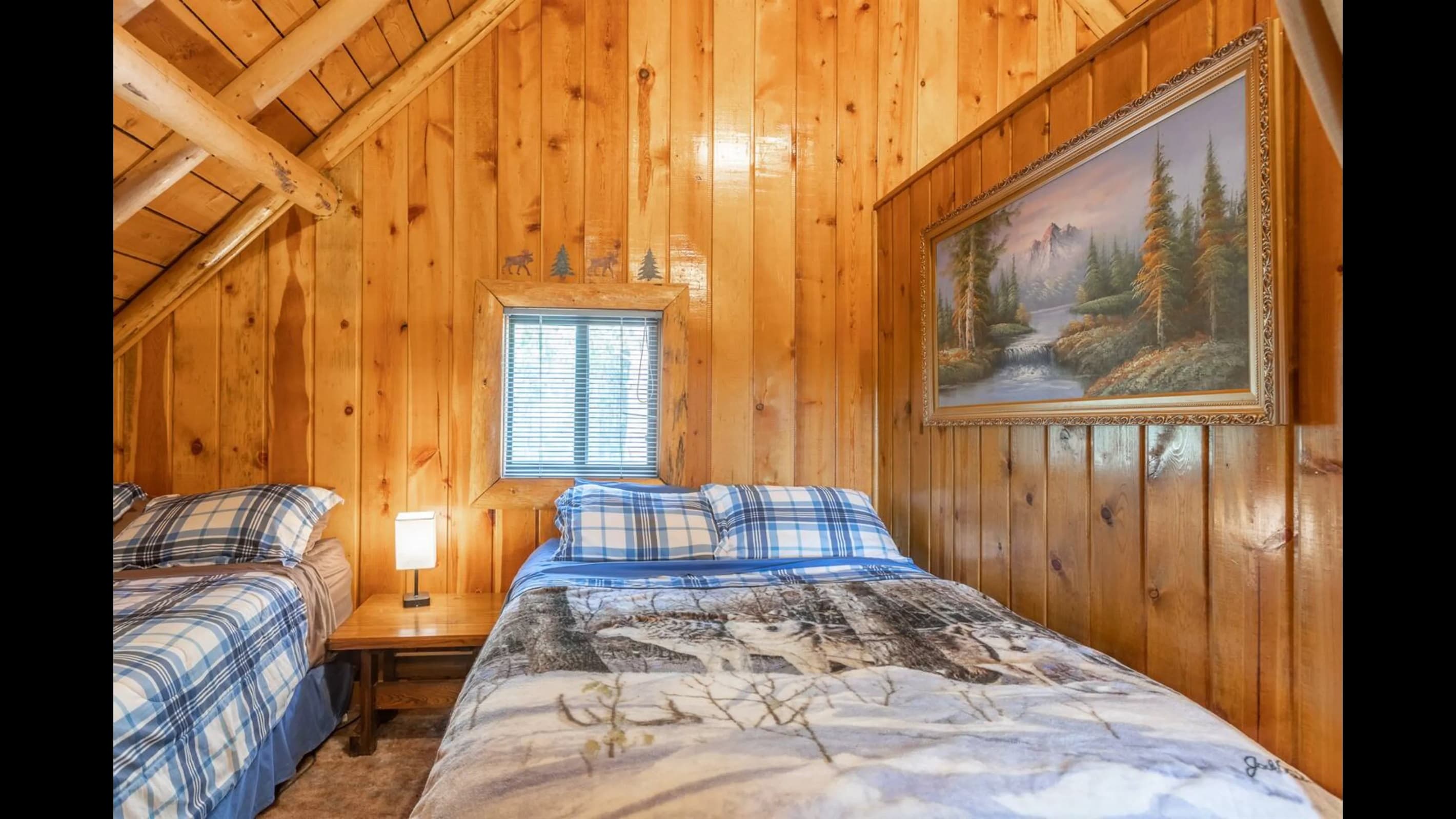 Loft area. Perfect for a large family or children.  This room has three large beds and space for everyone.
