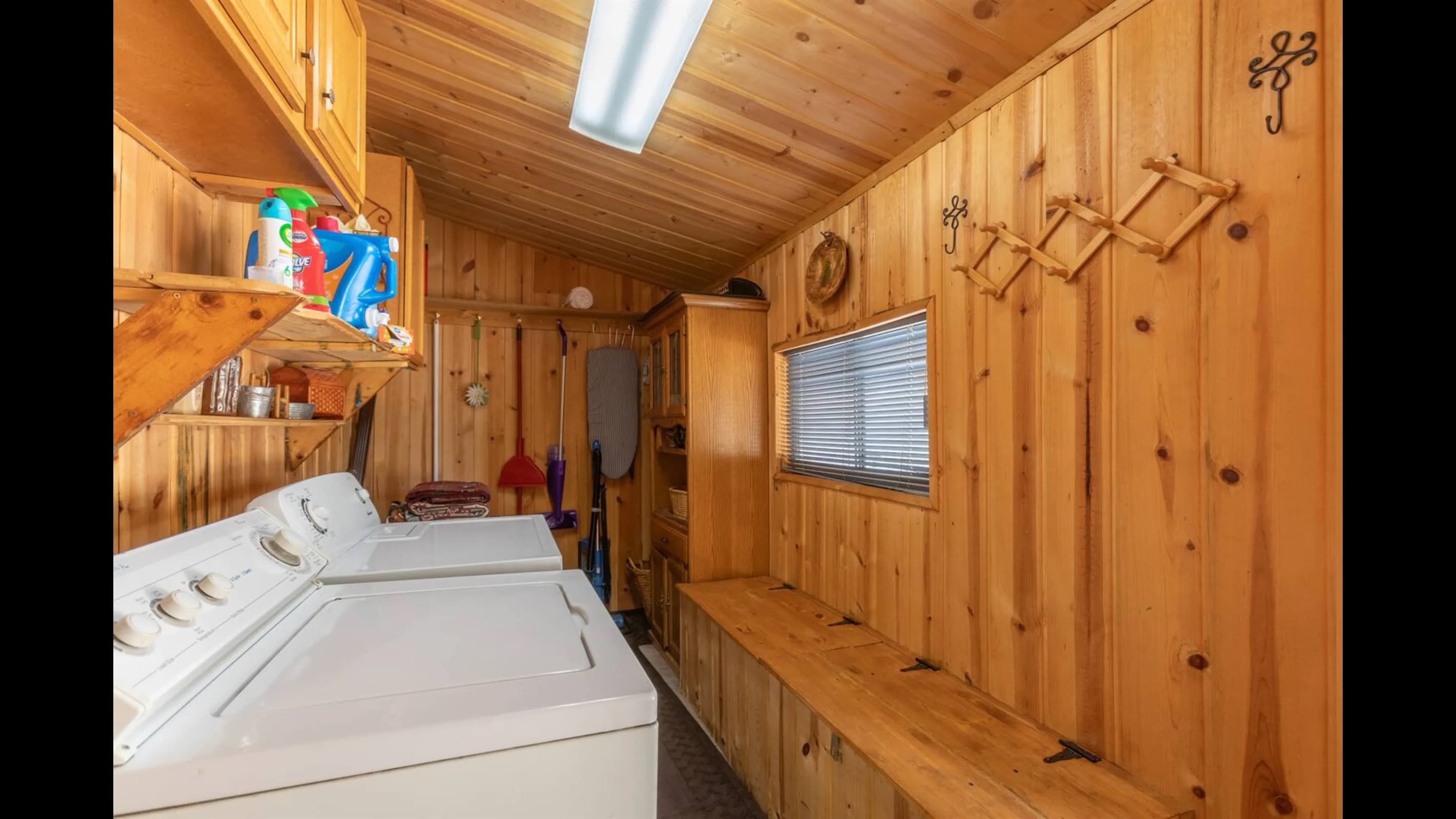 Washer and dryer with large long bench and natural light are downstairs for your convenience.