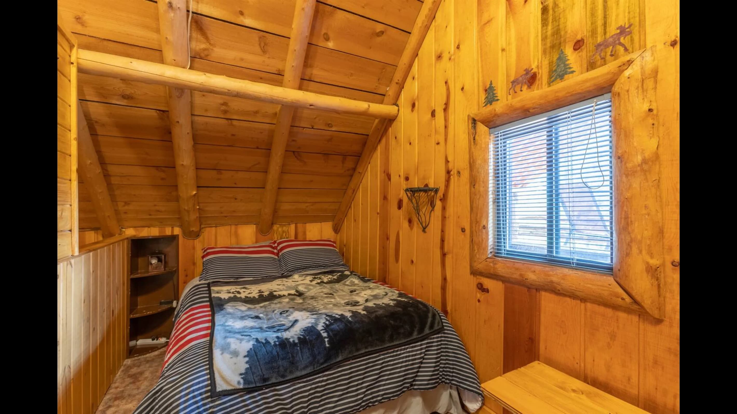 The south east corner bedroom upstairs  has a comfortable queen size bed.