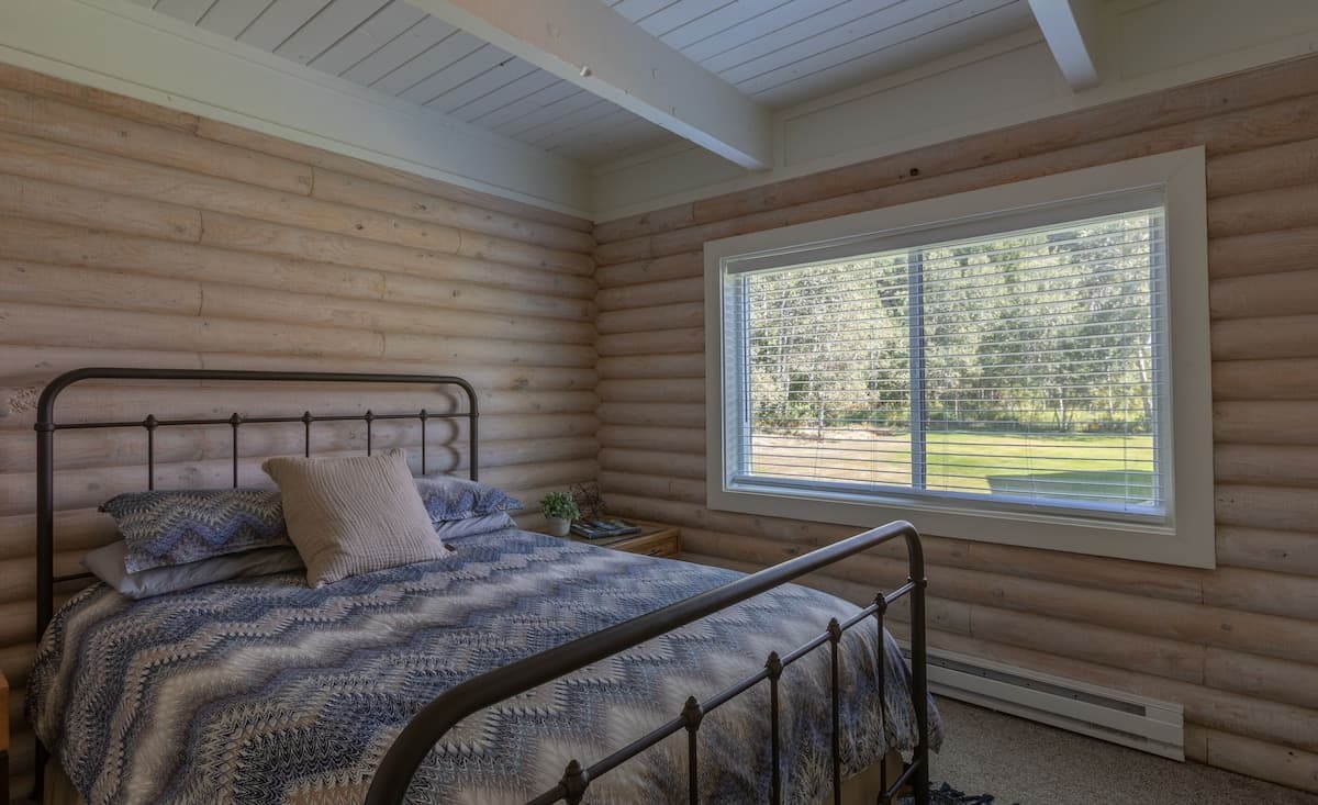 Bedroom #3 has a Queen bed and a beautiful view.