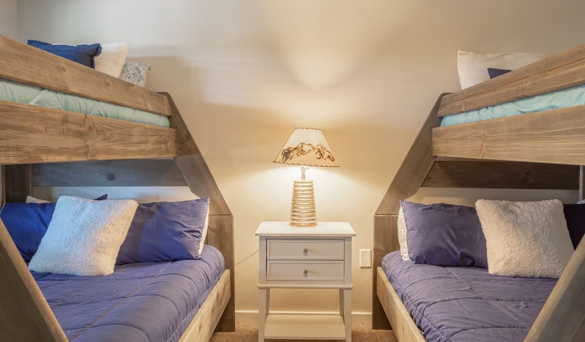 Bedroom #5 with two twin over full bunk beds.