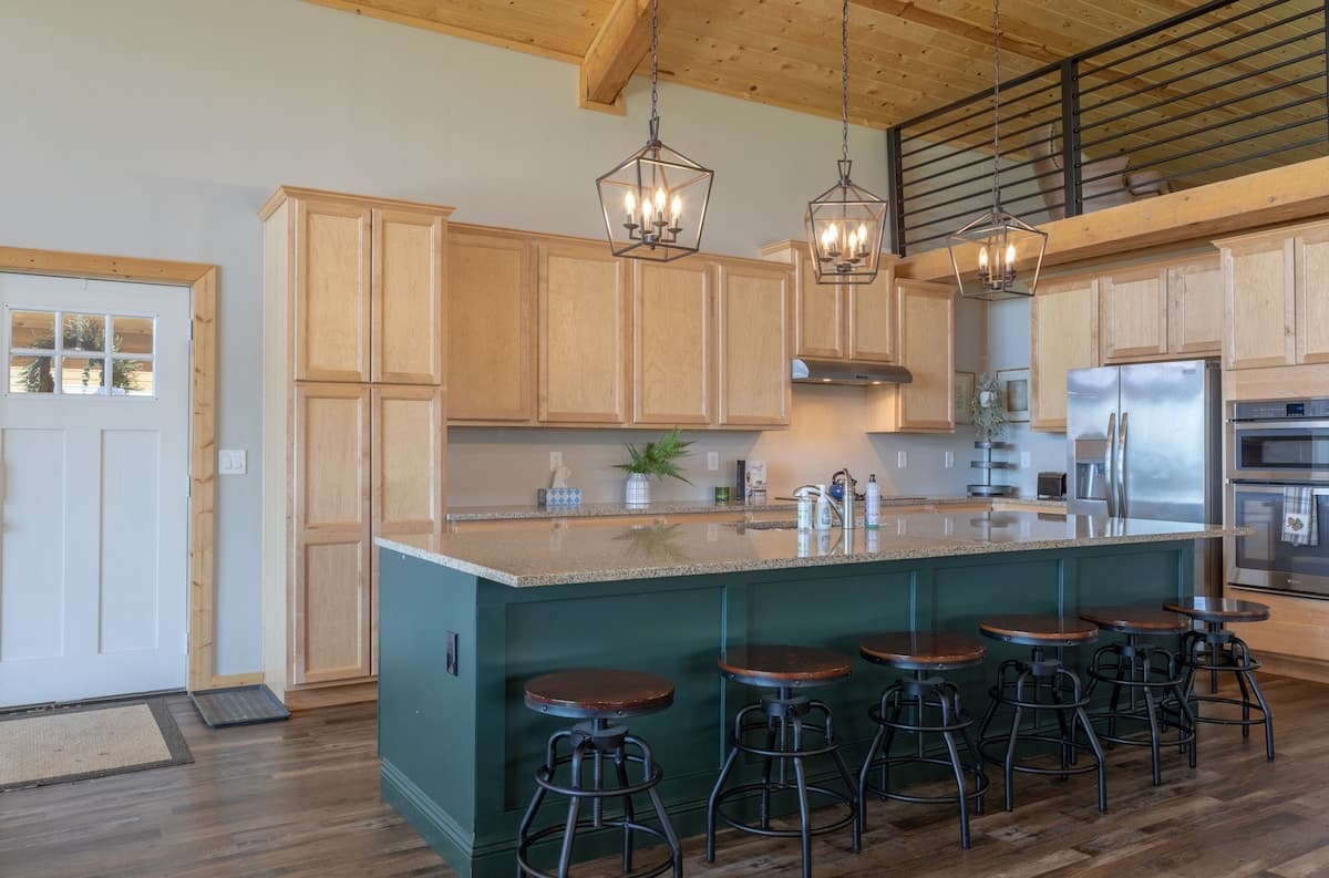 The full kitchen allows you to cook your best home dishes. The Island has 6 bar stools.