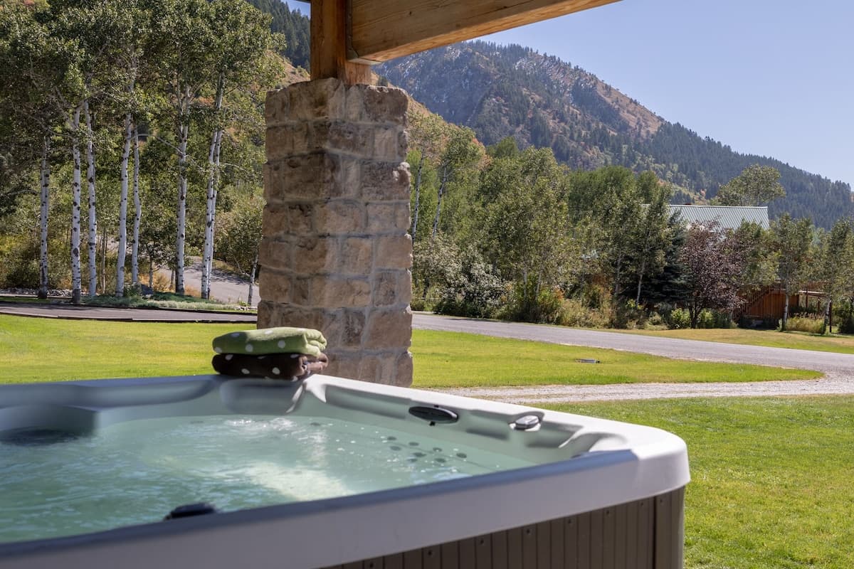Take a break from it all and relax in the hot tub as you gaze at the scenery.
