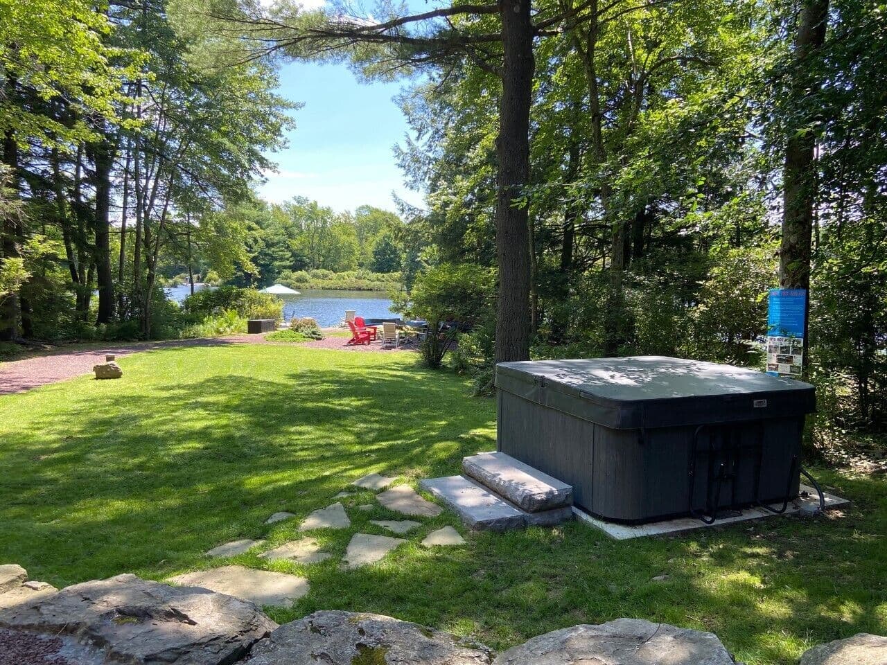 The hot tub looks over the lake. Enjoy a refreshing dip.
