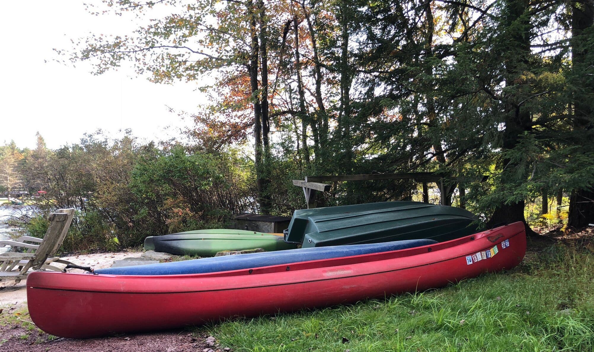 4 kayaks, canoe, row boat
