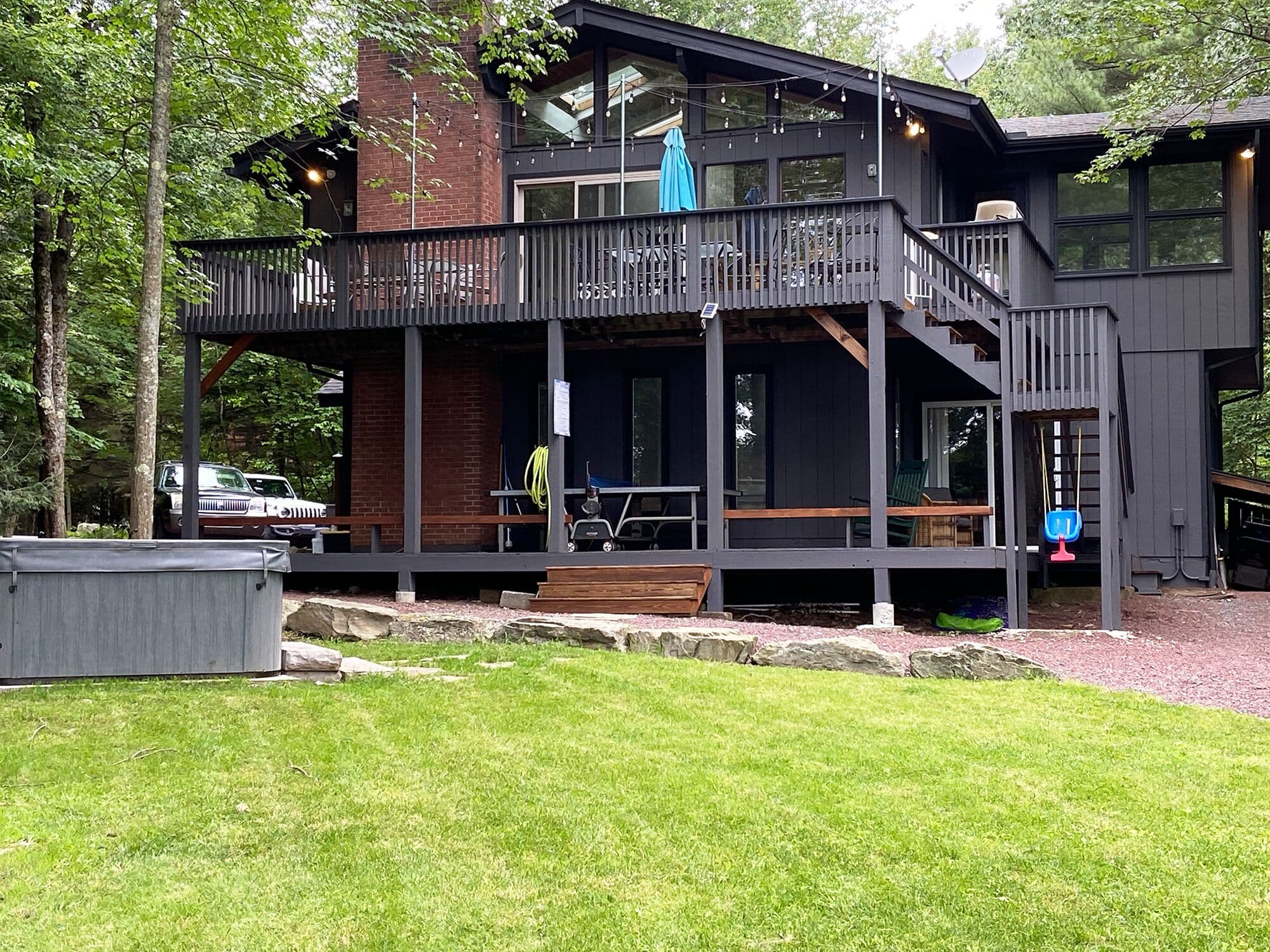 Hot tub. 2 decks on the back of the house: Ping Pong & dining