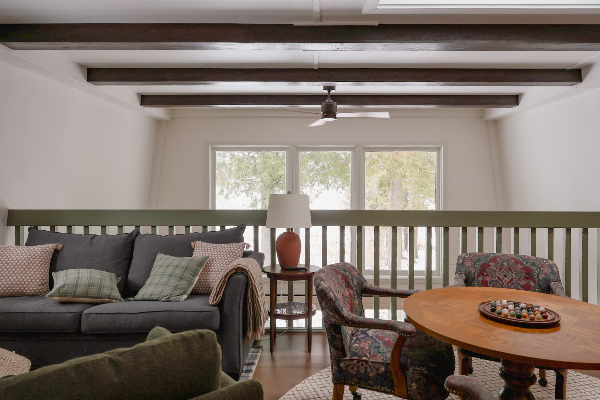 Loft with new wooden beams, game table, tv, games and the perfect spot for your kids to enjoy and relax after a day exploring or on the lake.
