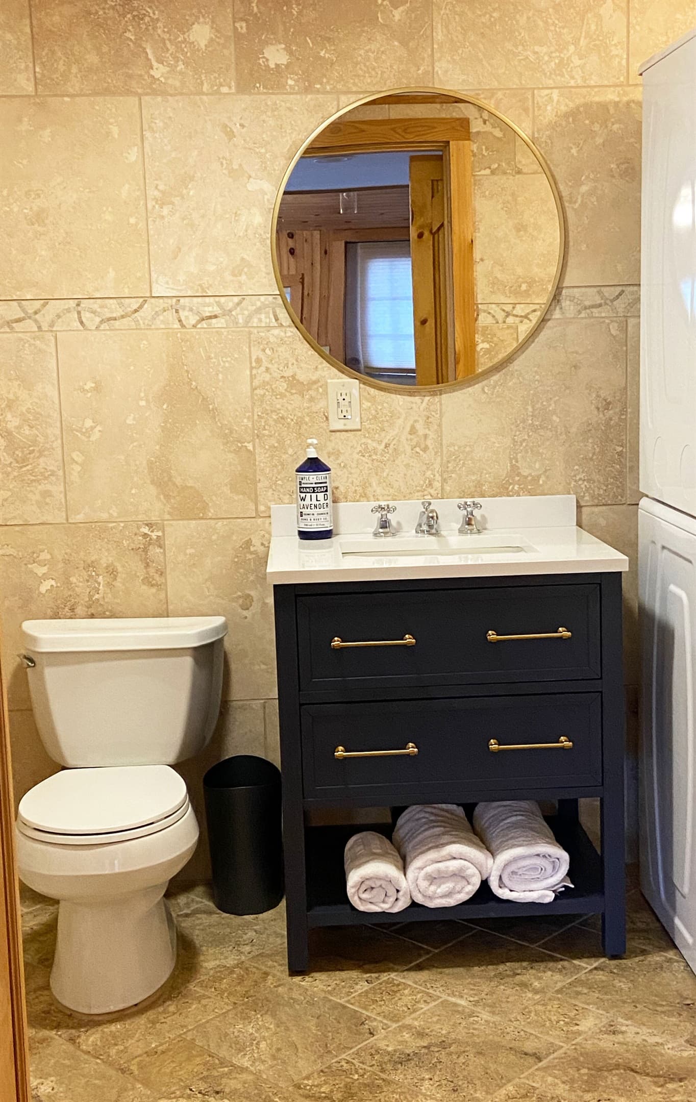 First-floor bathroom vanity. The bathroom includes a tub/shower