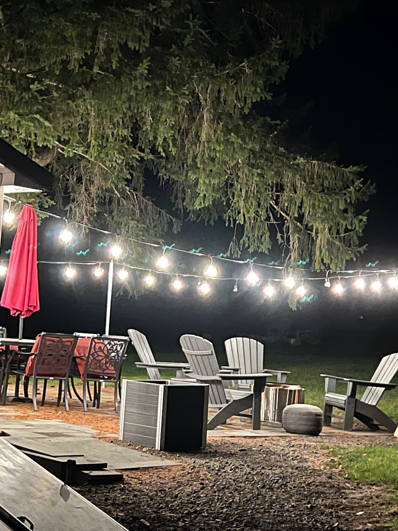 fire pit and Adirondack chairs