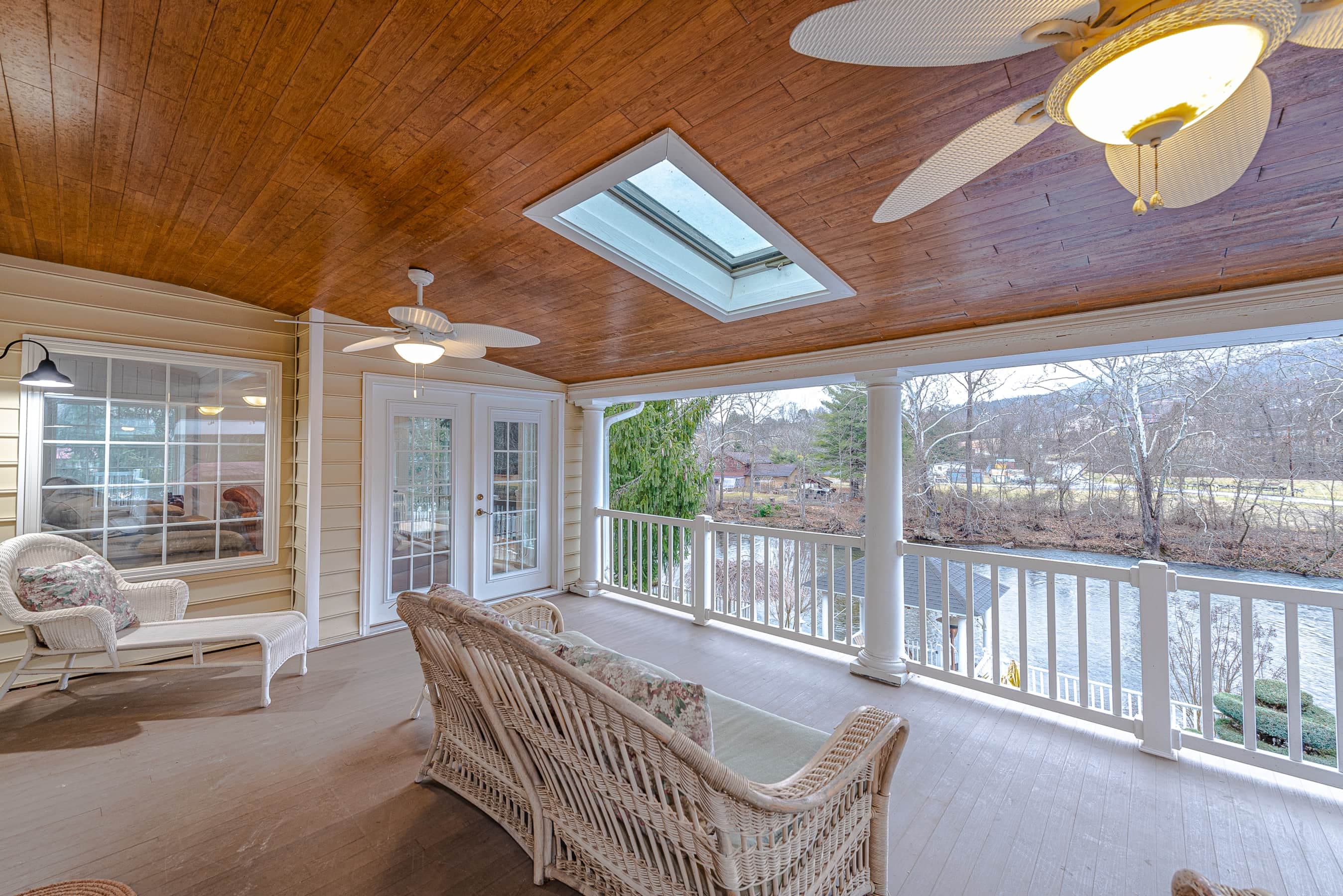 Main Floor covered porch overlooking the River