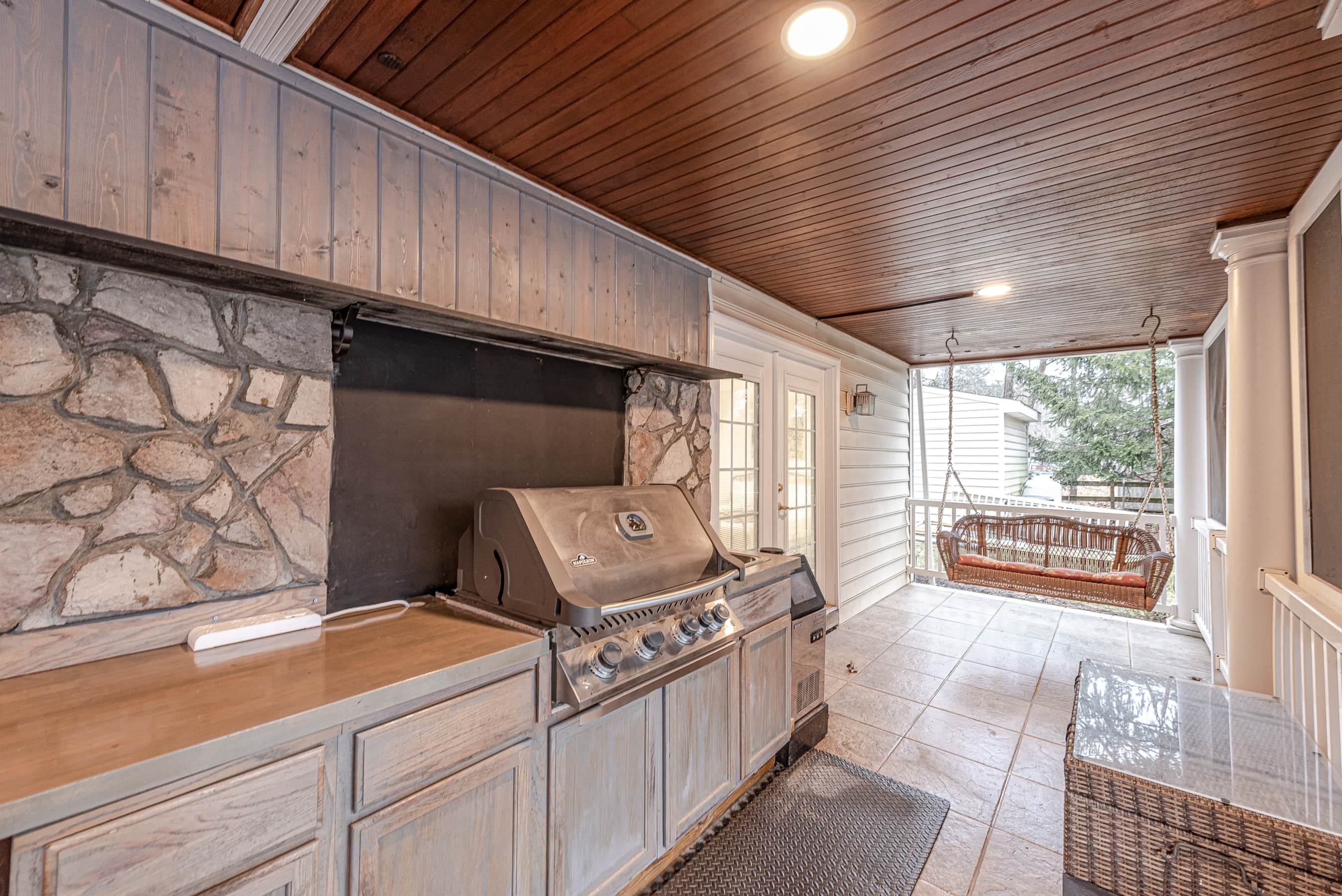 Outdoor Grill by the Pool and Bar