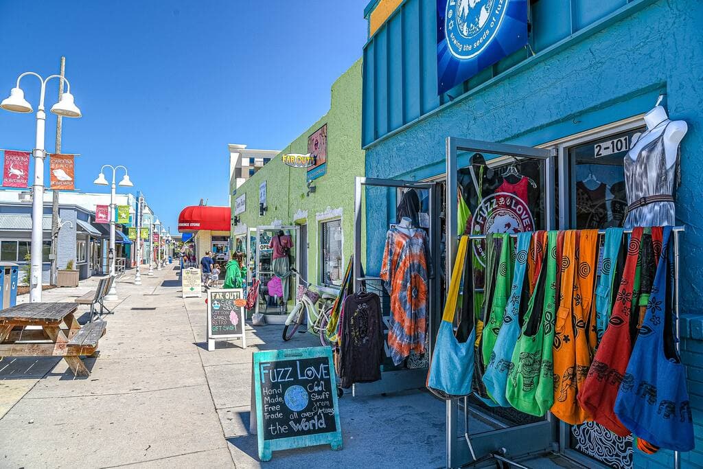 Carolina Beach boardwalk featuring shops and restaurants