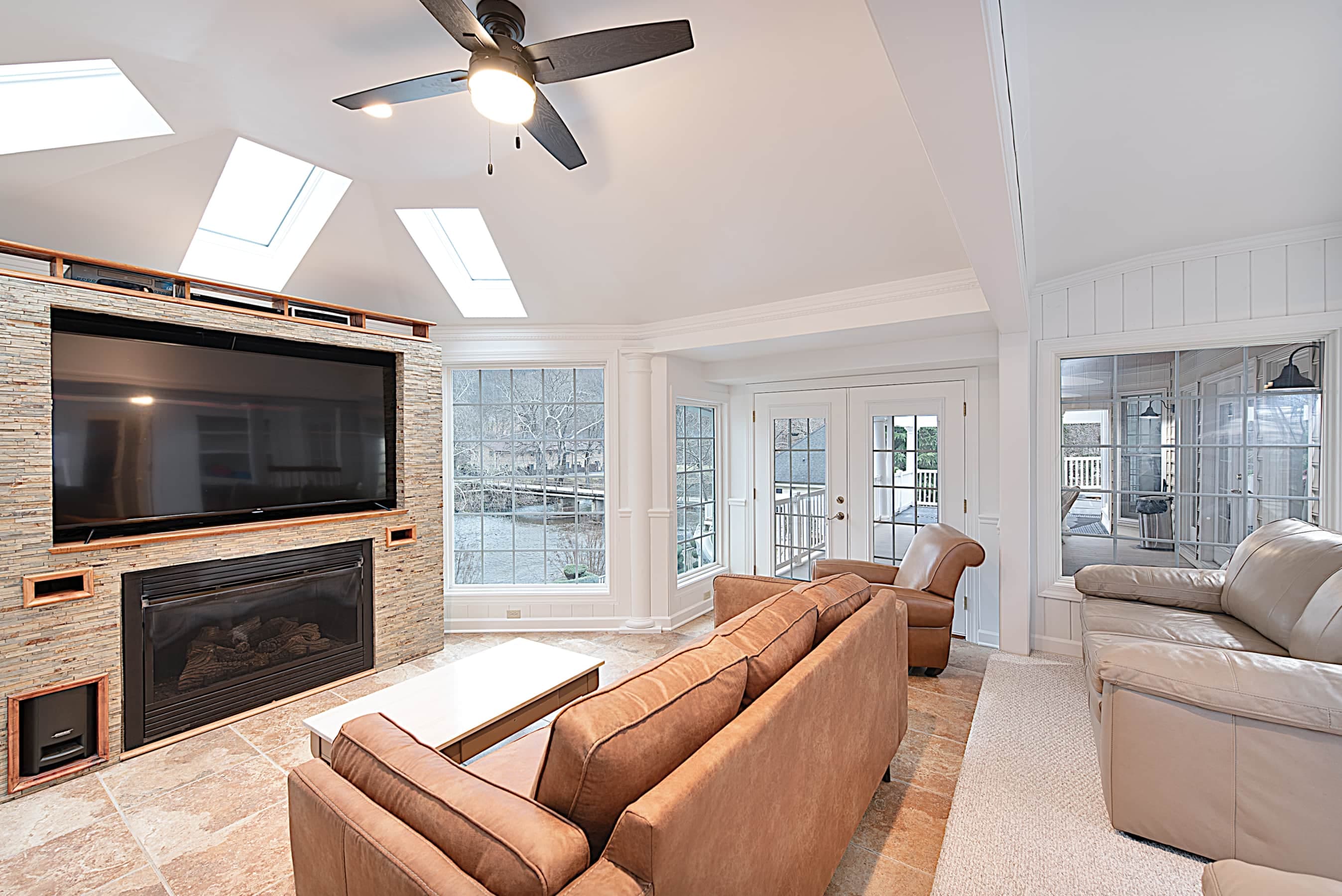 Main Floor Theater Room with FIreplace and Amazing Views