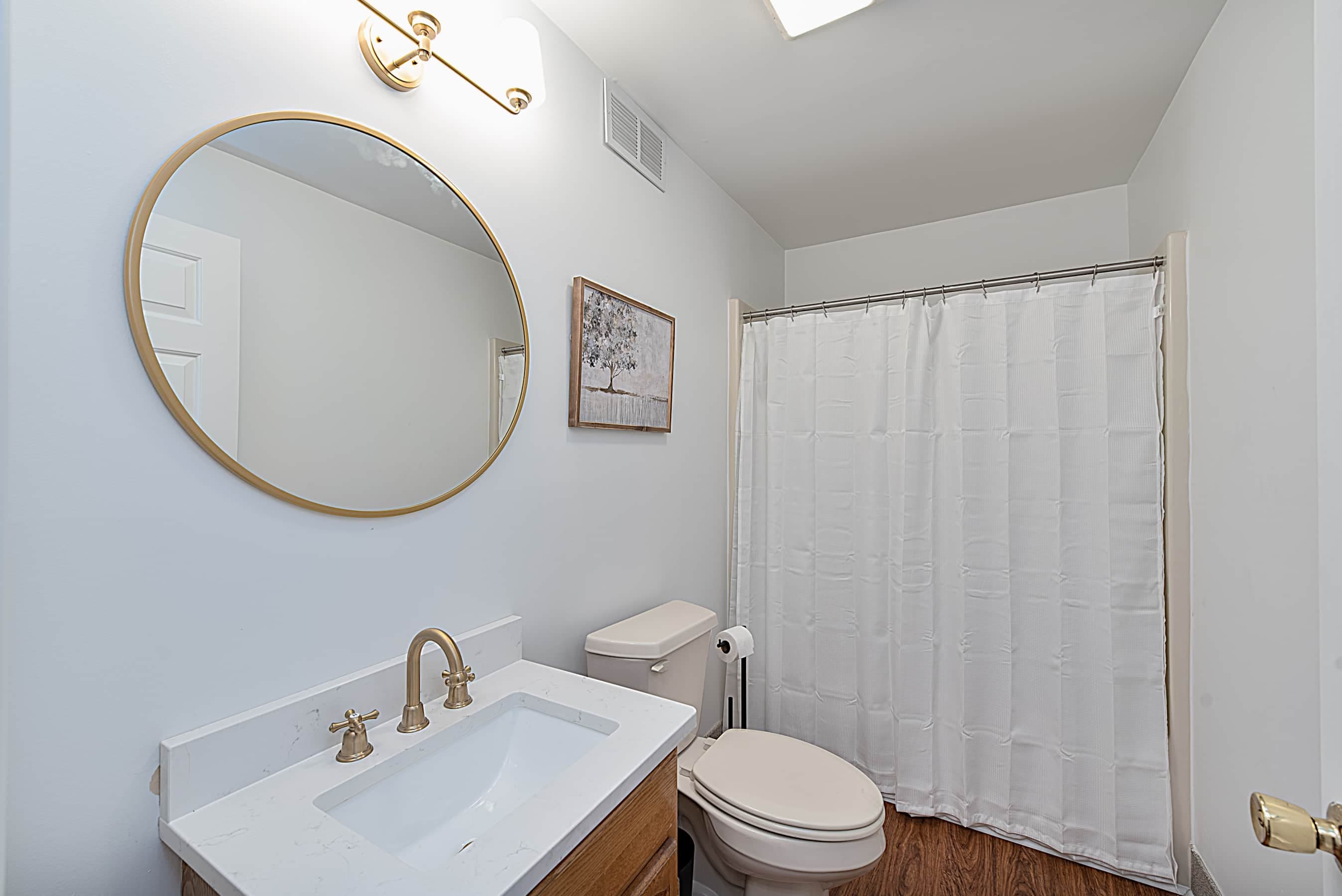 Bottom Floor Bathroom with Shower and Tub