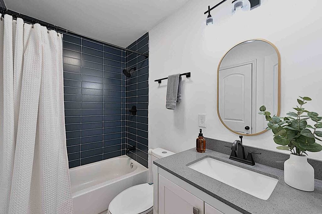 Renovated bathroom with a Tub Shower combo