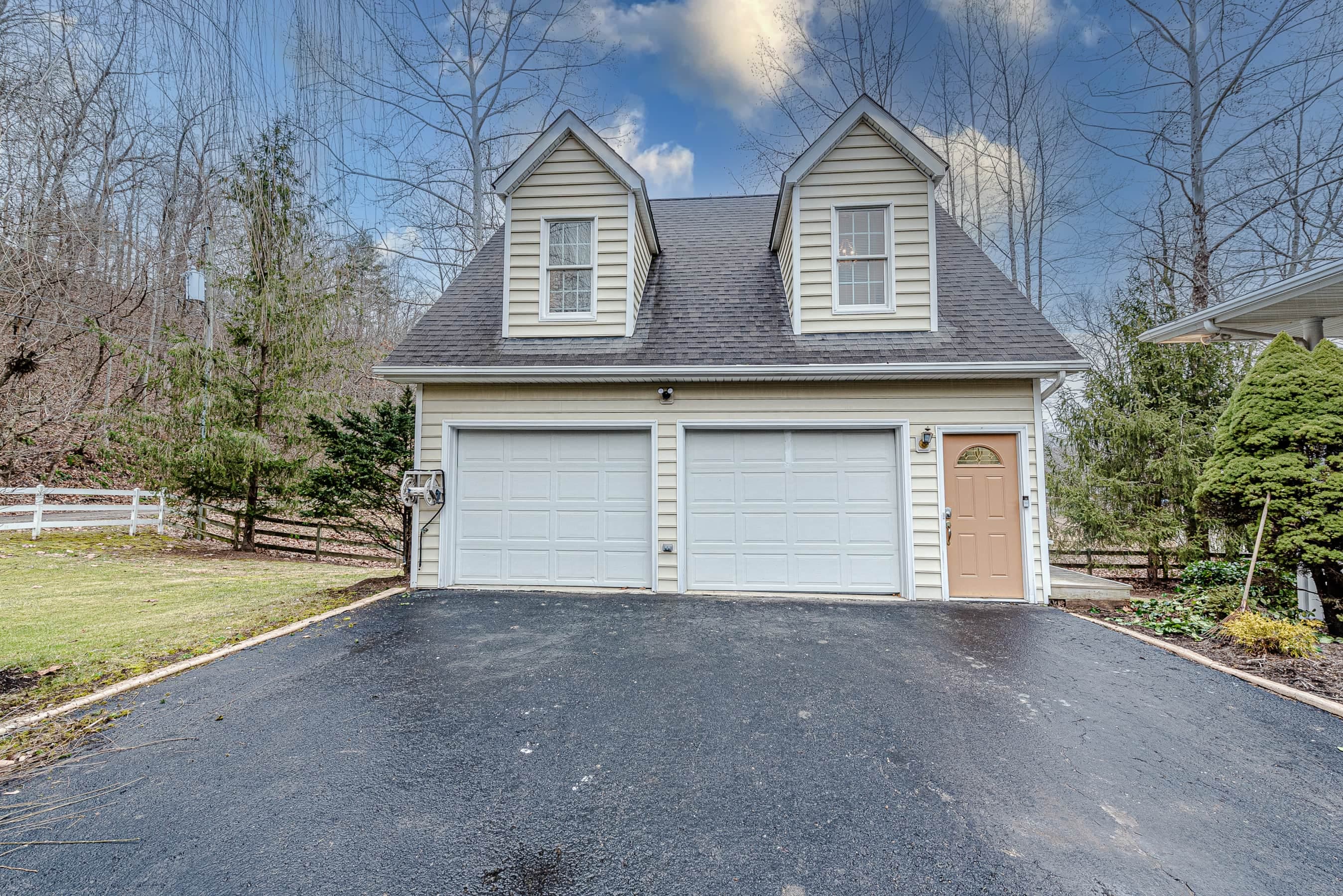 Studio Apartment  Parking Spot in front of Left Garage Door