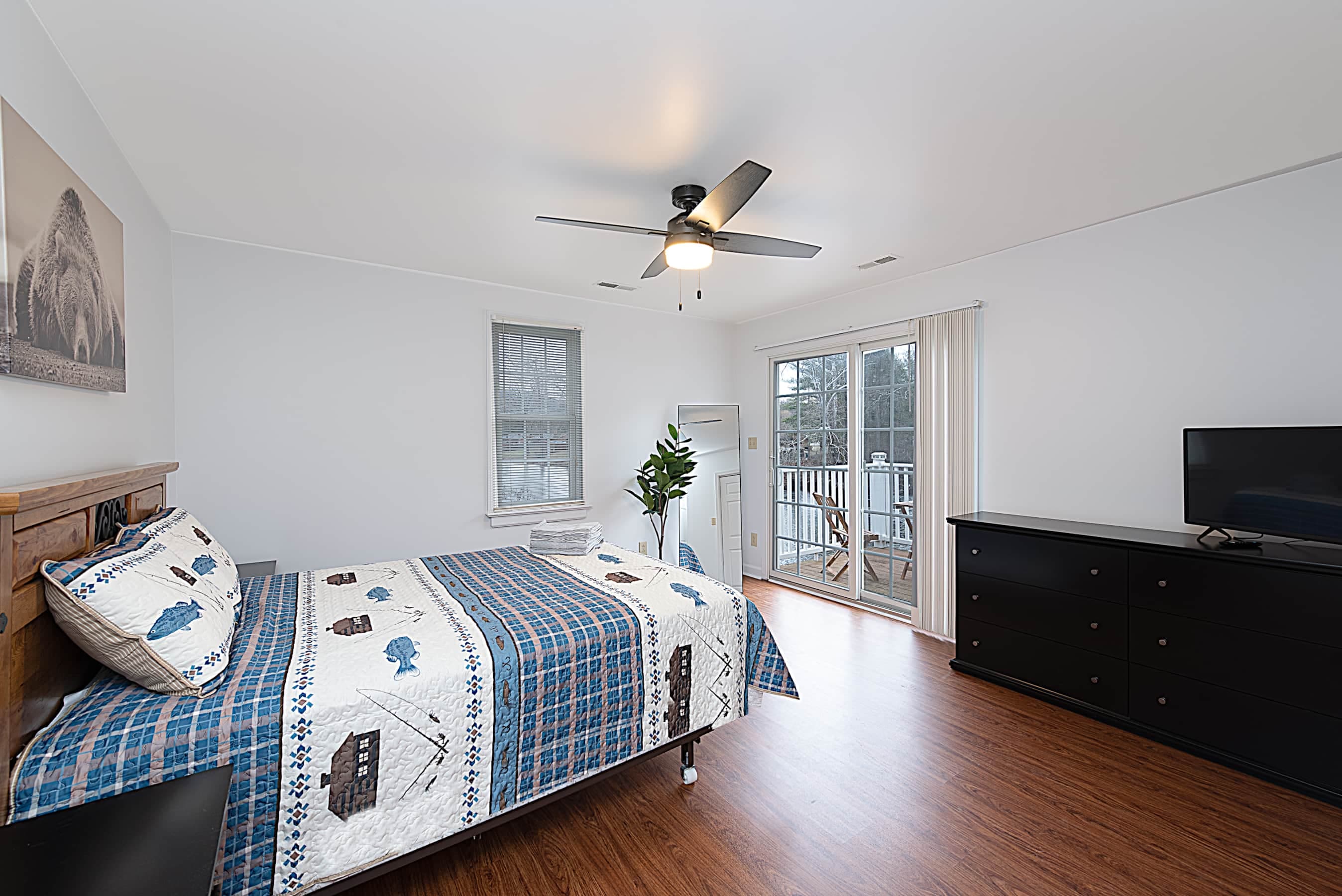 Master Bedroom with Queen Bed and Balcony