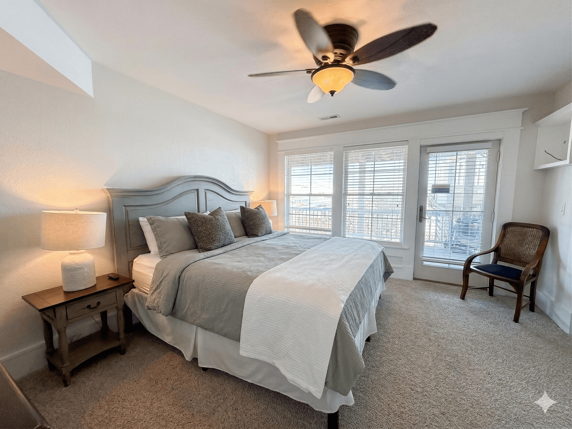 Bedroom 8 — Comfortable King Bed with Coastal Charm & Ceiling Fan | One of 18 Bedrooms at The Mark Twain, Outer Banks