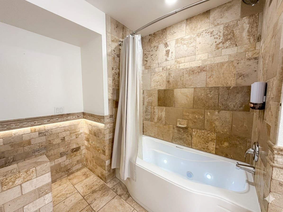 Bathroom 1 — Shared Ensuite Between Bedrooms 1 & 2 | Clean & Bright Finishes | The Mark Twain Estate, Outer Banks
