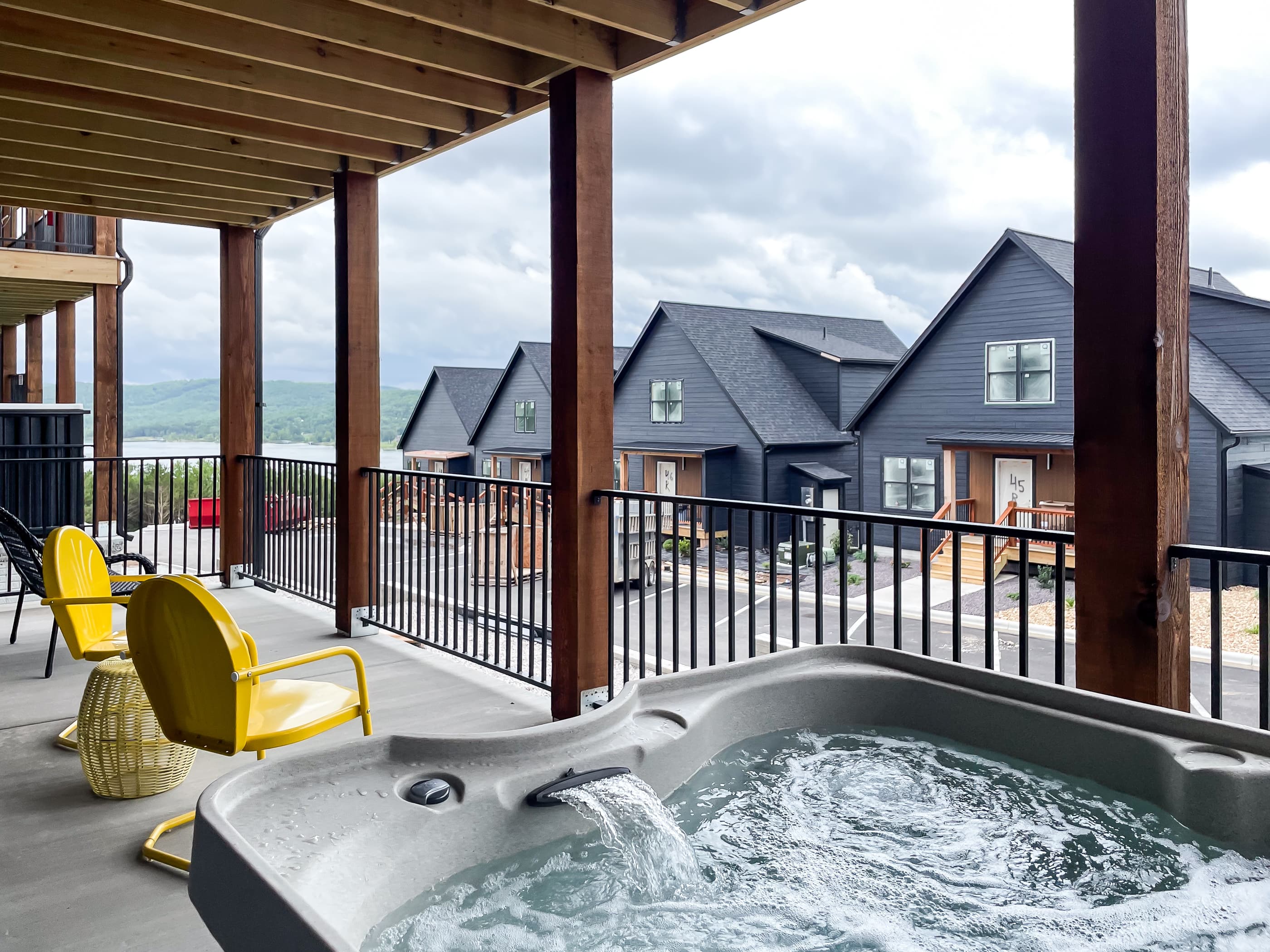 Lower patio with hot tub and extra seating