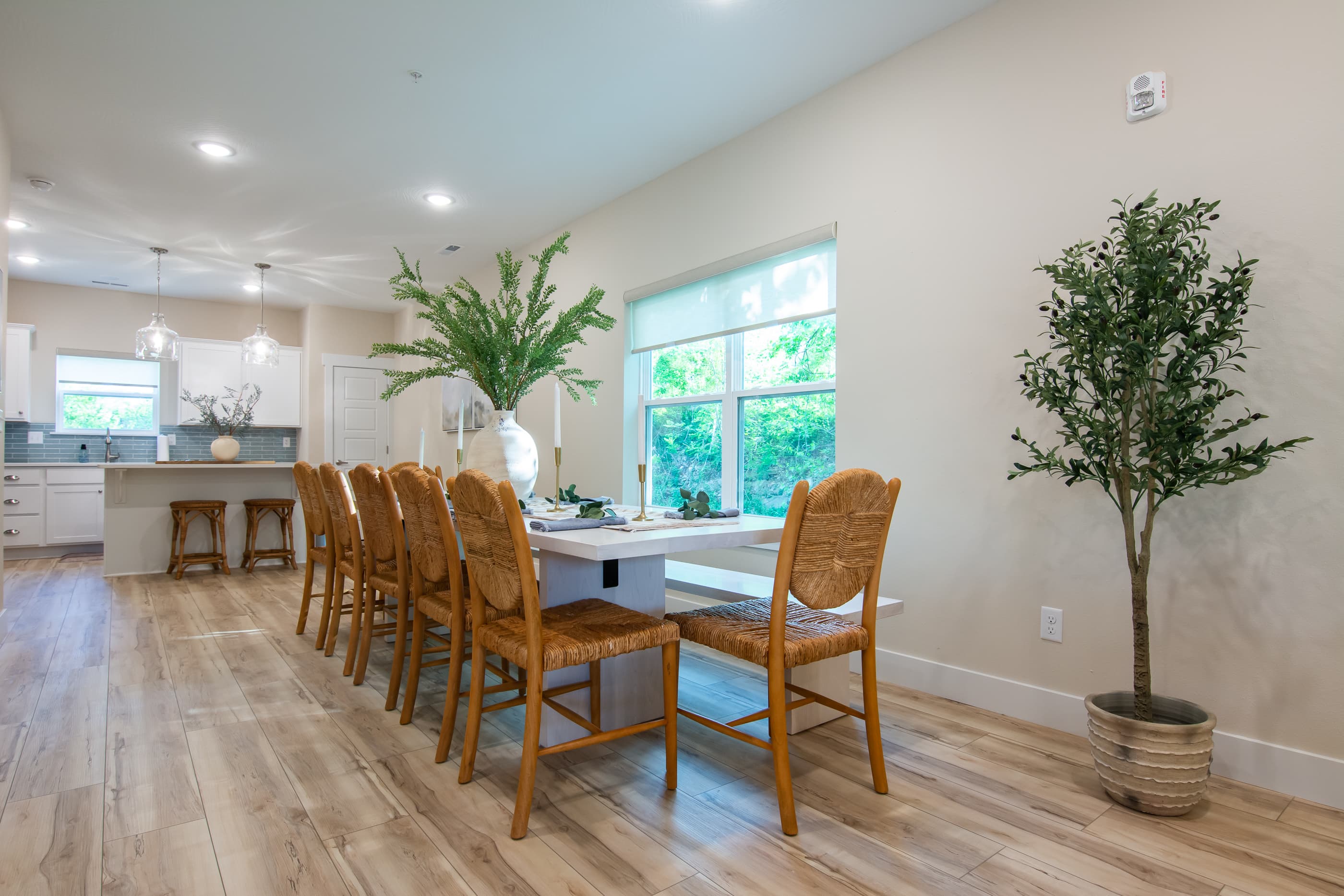Main level kitchen with large dining table and plenty of seating for the entire group!