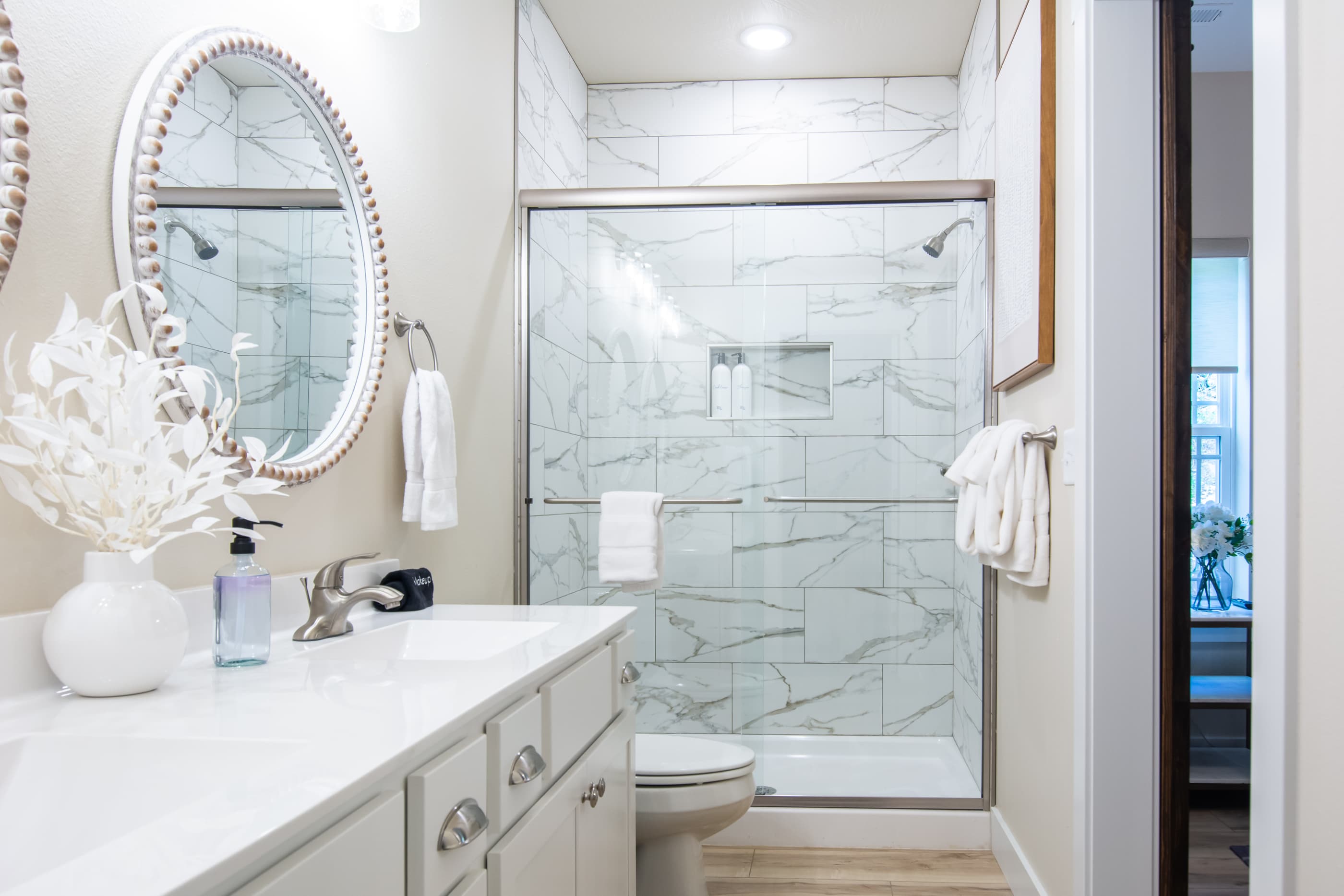 Main level en suite bathroom with step in shower
