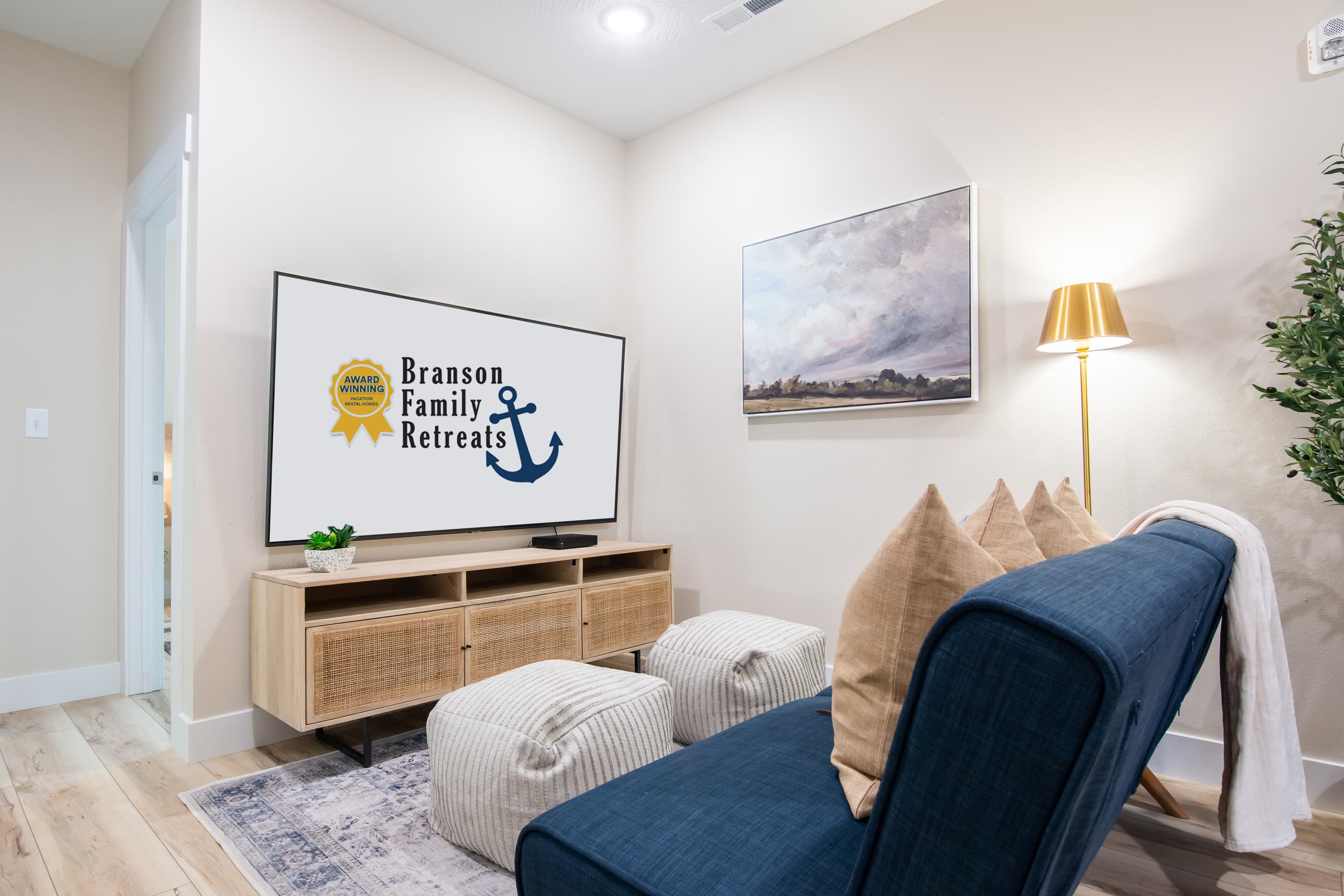 Upper level family/game room with comfy seating area