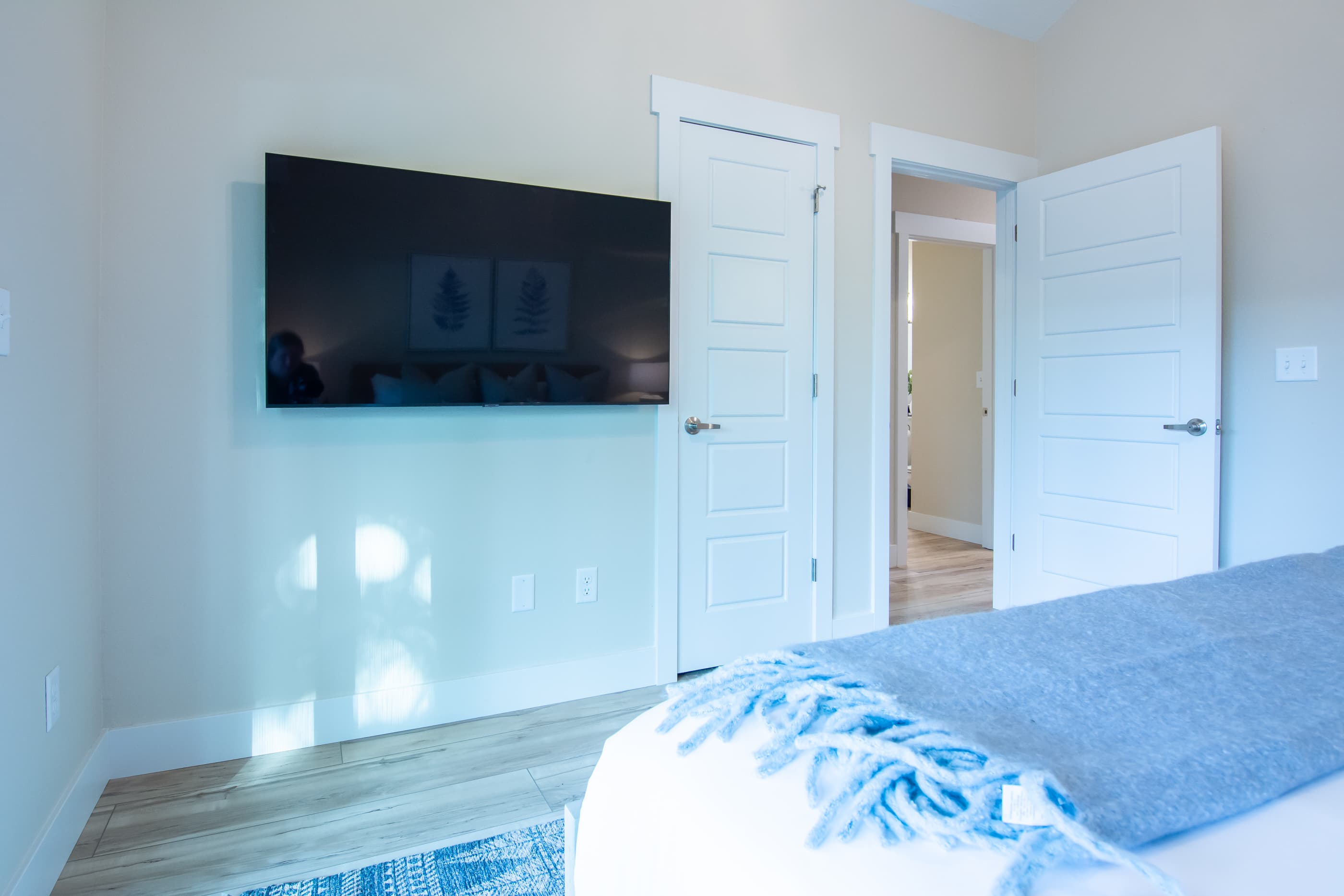 TV in upper level king bedroom with ample space