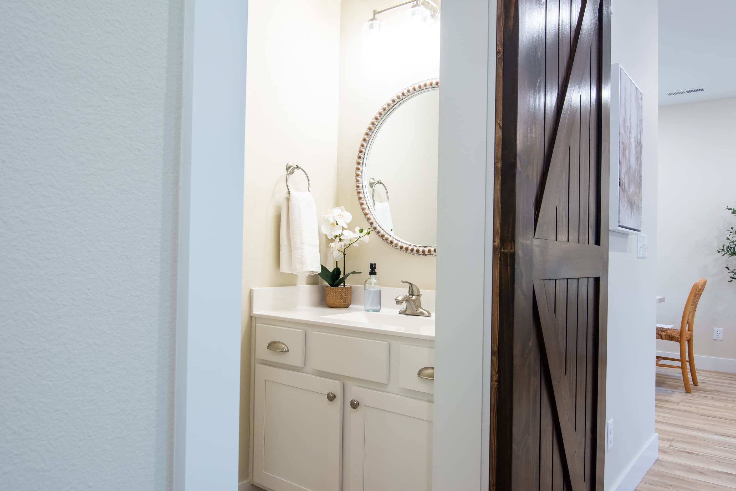 Main level half bathroom off of great room