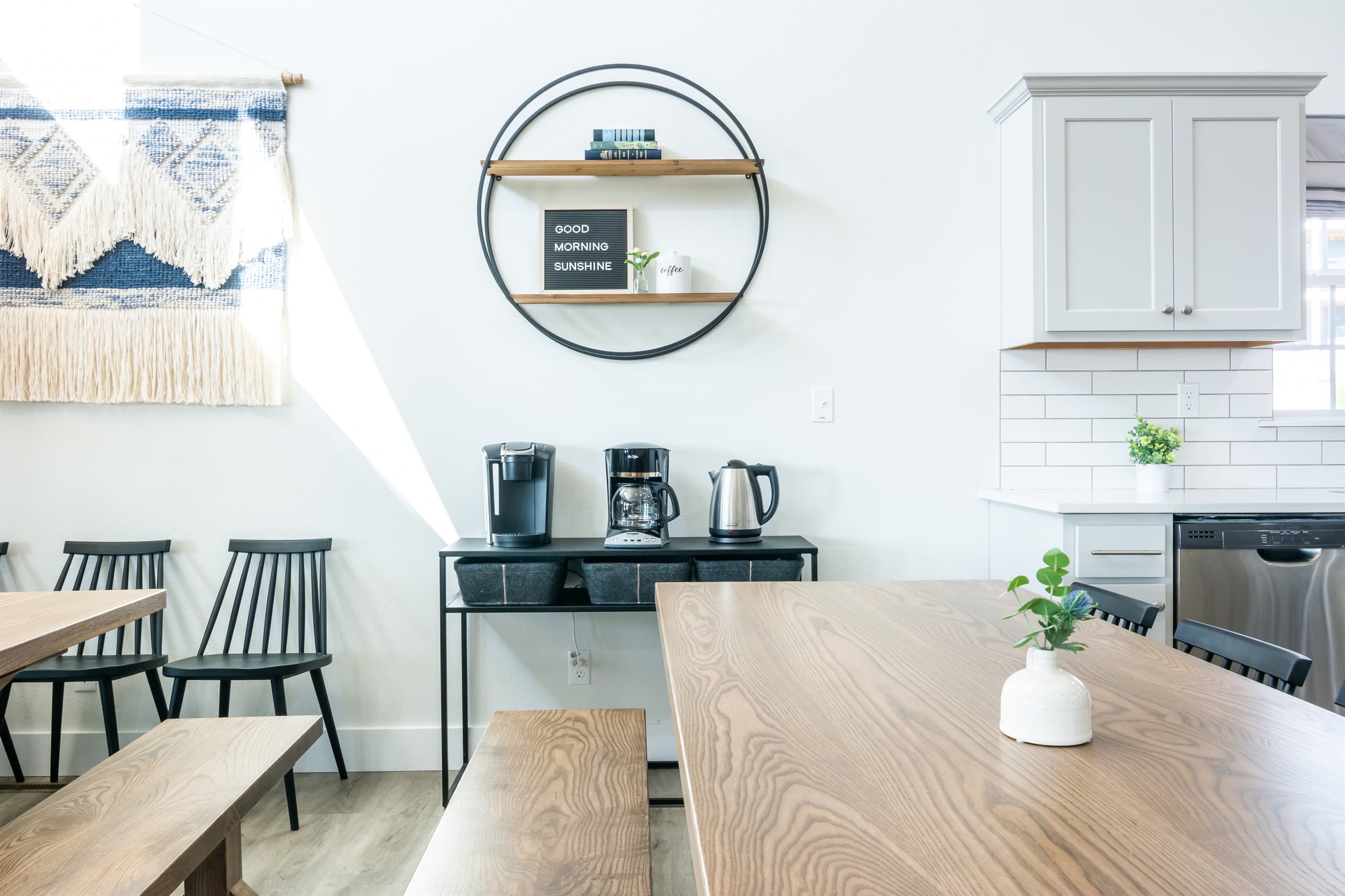 Coffee and tea station has a drip coffee maker, Keurig, and an electric tea kettle