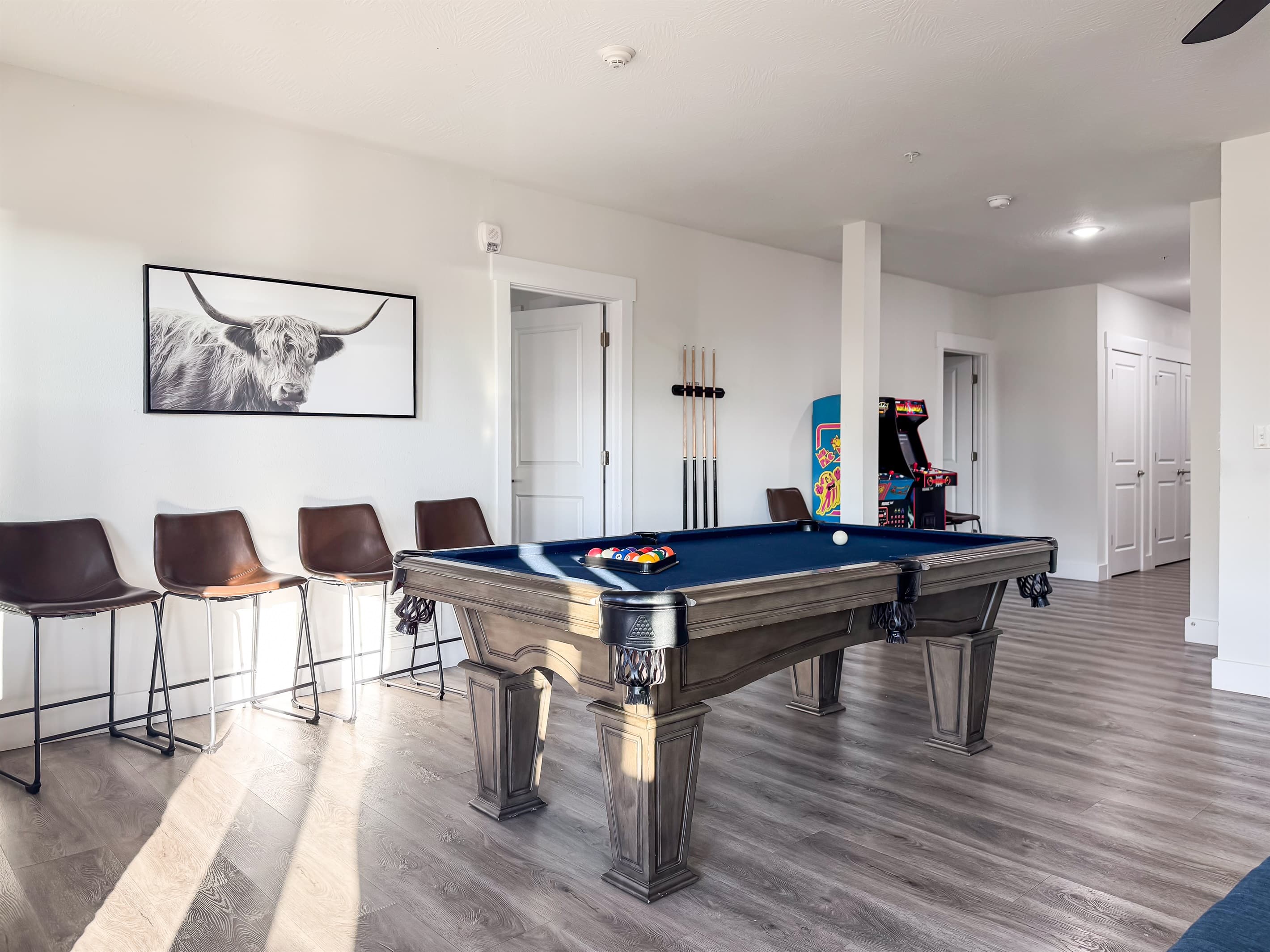 Pool table with seats for others to watch