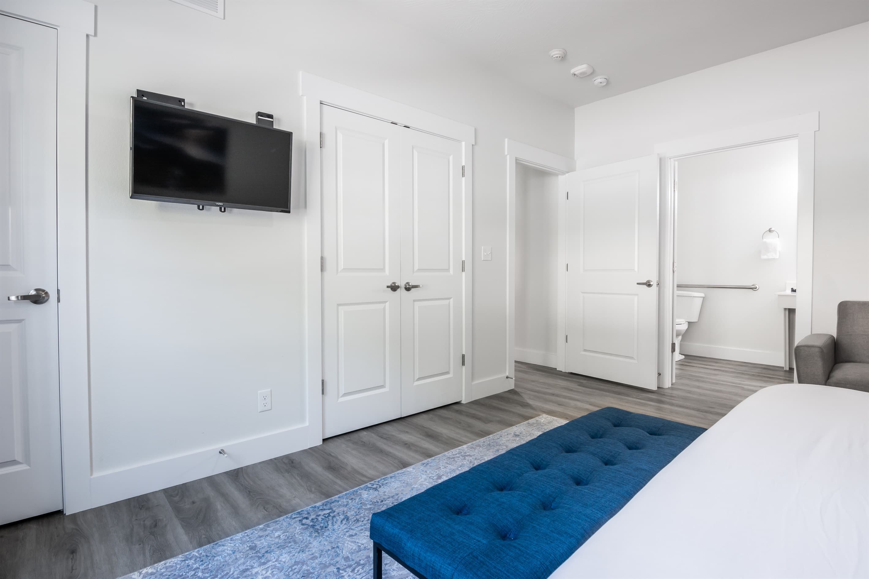 Bedroom 2 (main level, accessible): Across the bed is the Tv