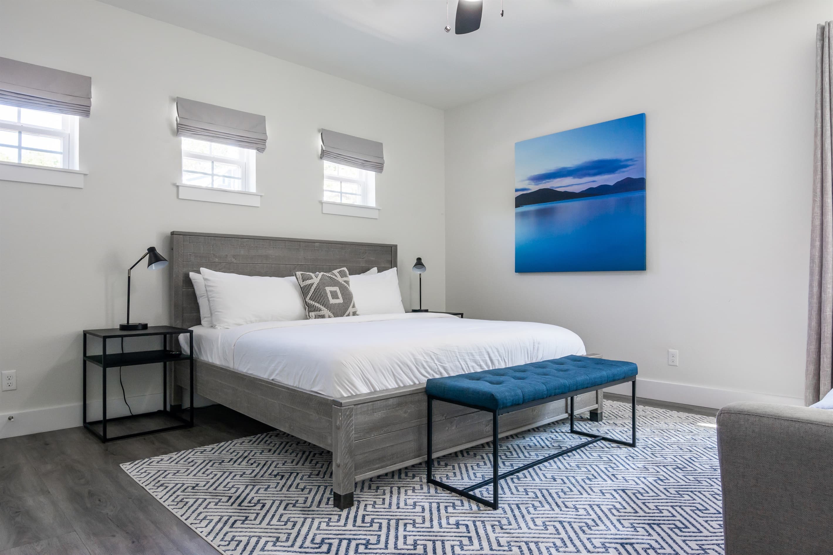 Bedroom 5 (upper level): King bed + Futon and en-suite bathroom with tub