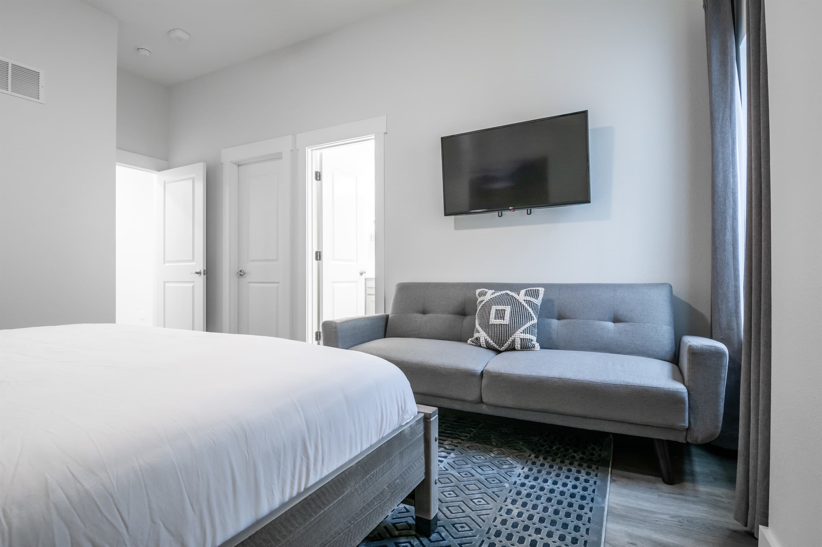 Bedroom 9 (lower level): Futon with Tv above