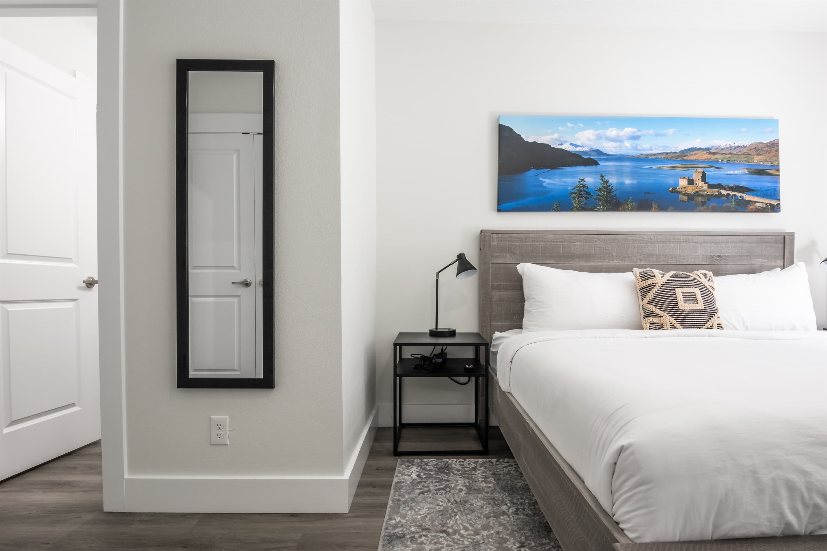 Bedroom 8 (lower level): King bed with two nightstands and en-suite access