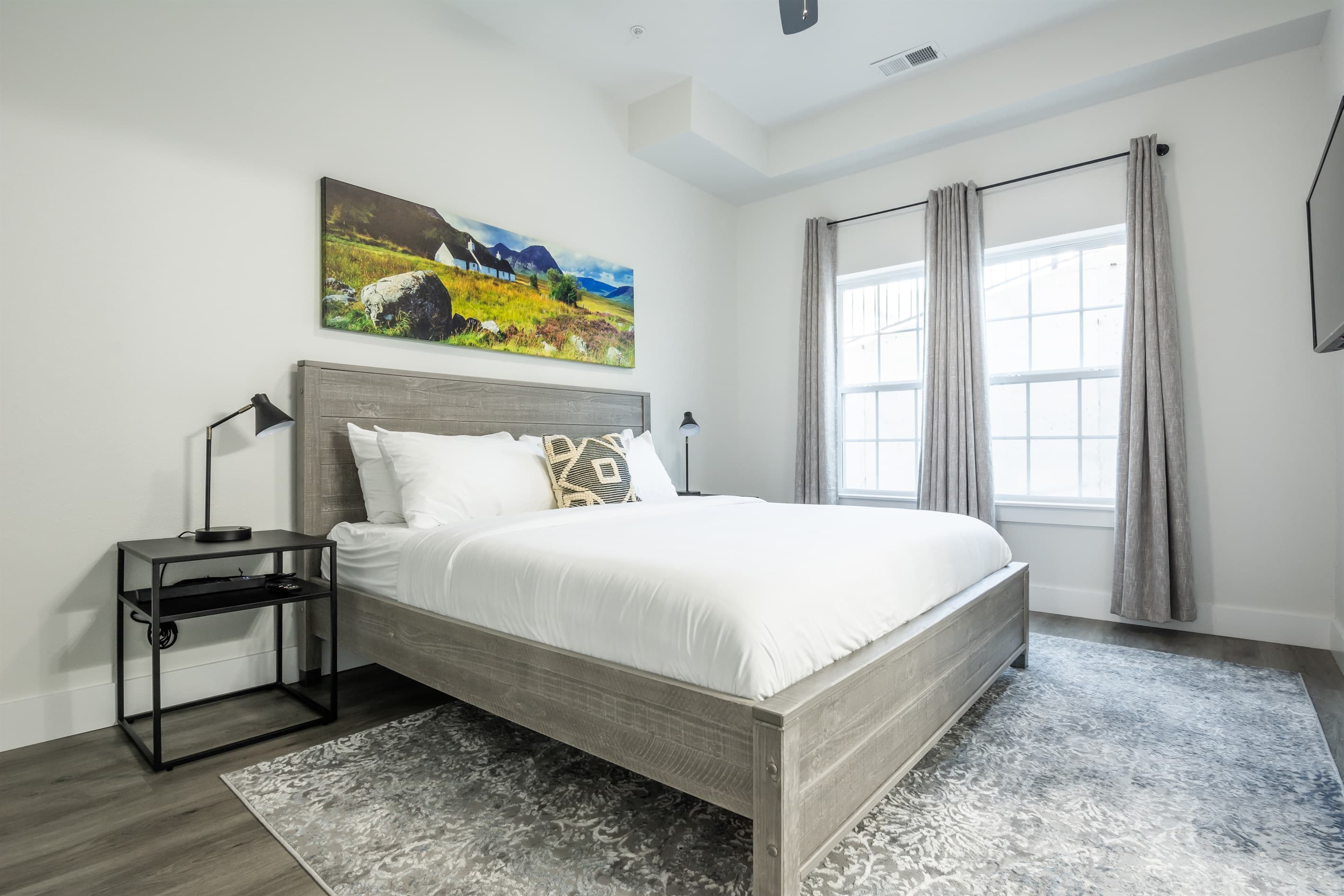 Bedroom 7 (lower level): King bed with two nightstand and en-suite